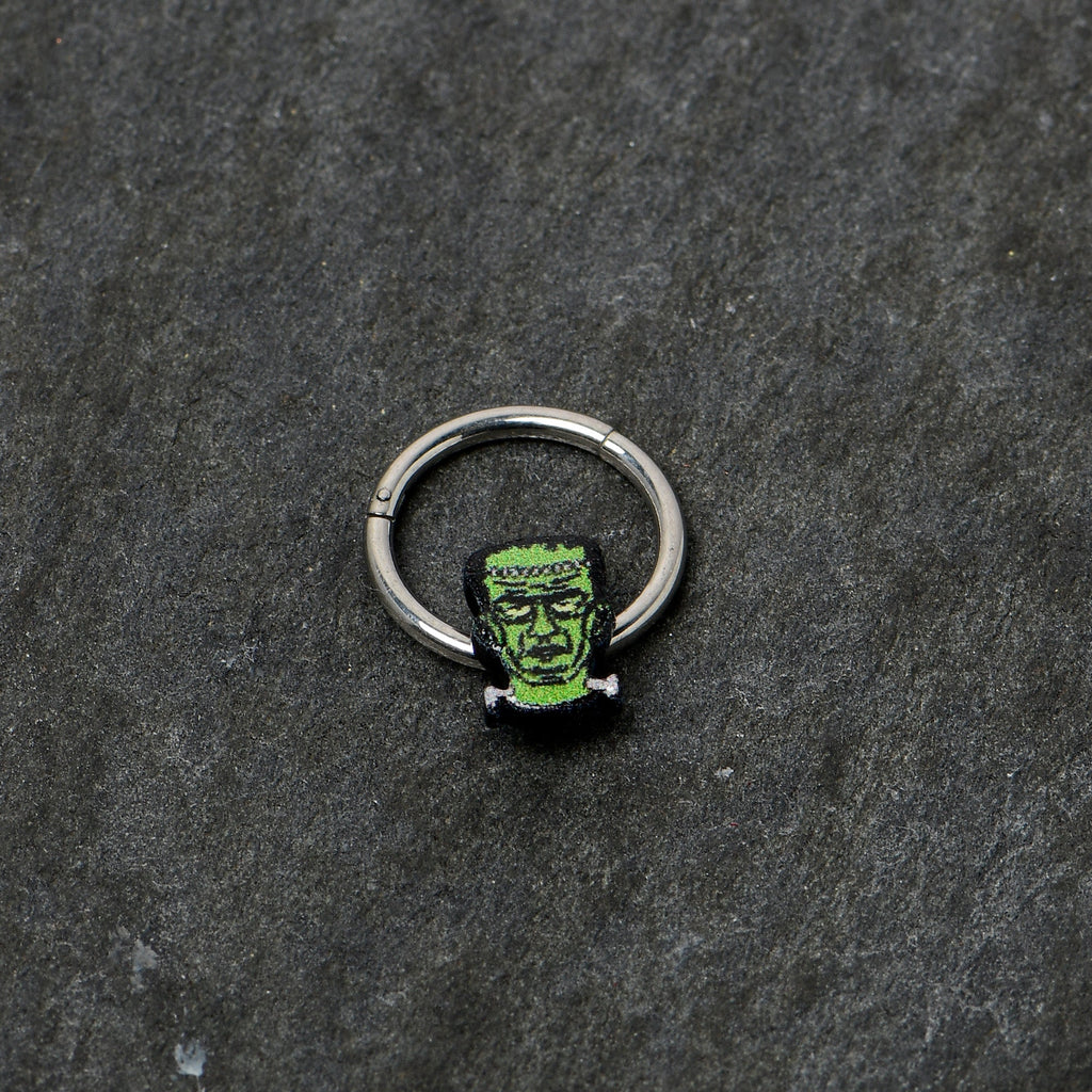 BodyCandy 16G 3/8 Frankenstein Head Green Glow in Dark Hinged Segment Ring — back view