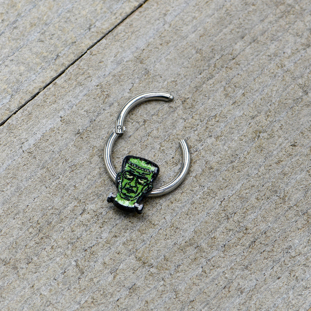 BodyCandy 16G 3/8 Frankenstein Head Green Glow in Dark Hinged Segment Ring — in-use photo