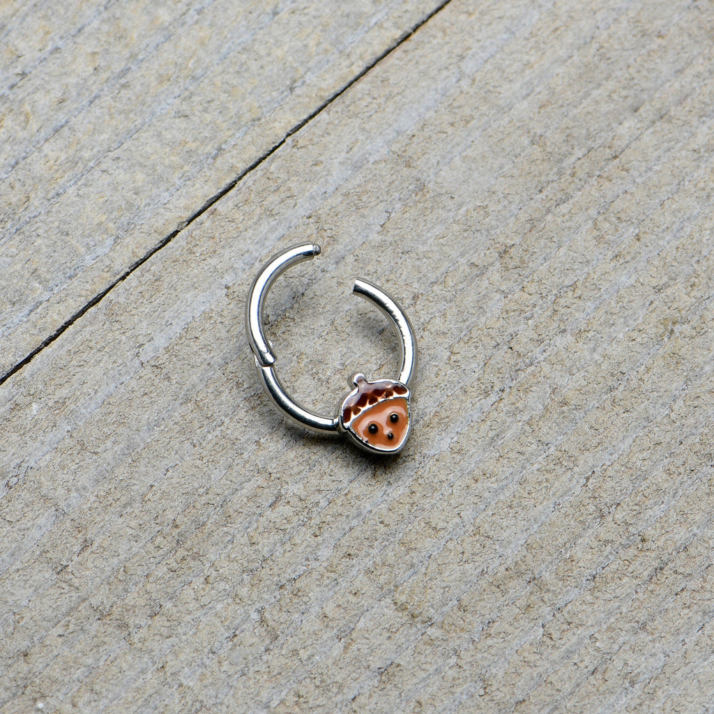 BodyCandy 16G 5/16 Fall Acorn Face Brown Autumn Hinged Segment Ring — in-use photo