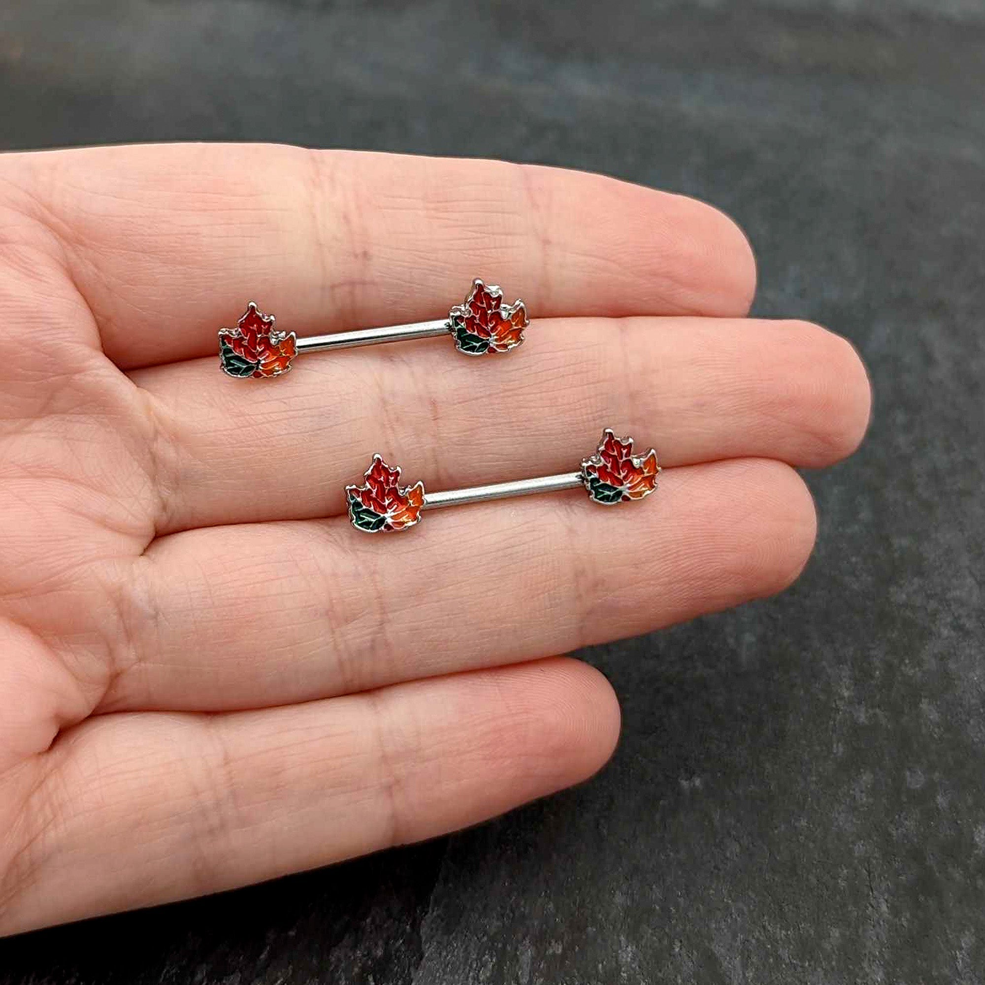 BodyCandy 14G 9/16 Autumn Tricolor Maple Leaf Barbell Nipple Ring Set — in-use photo