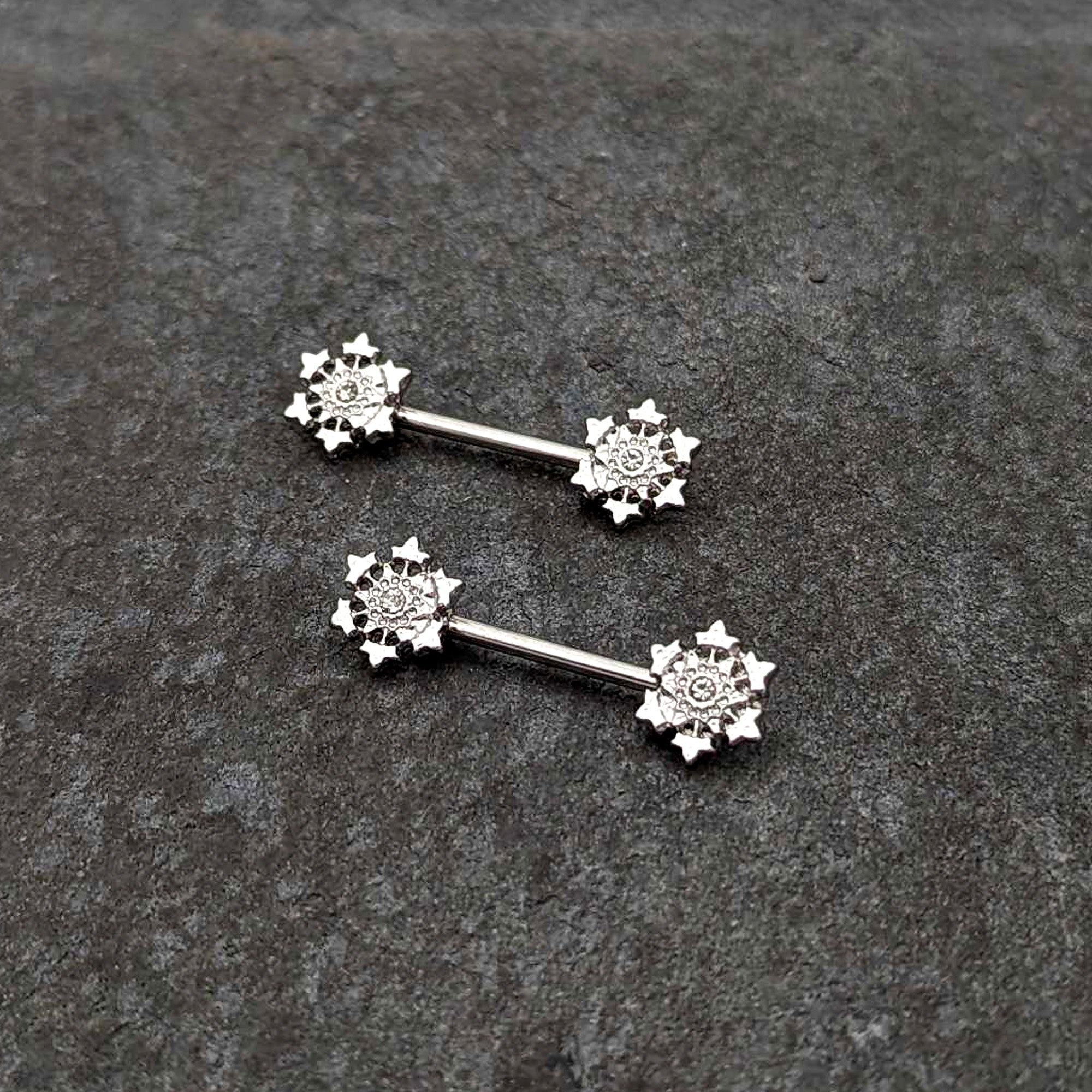 BodyCandy 14G 9/16 Clear Gem Filigree Winter Snowflake Nipple Ring Set — side view