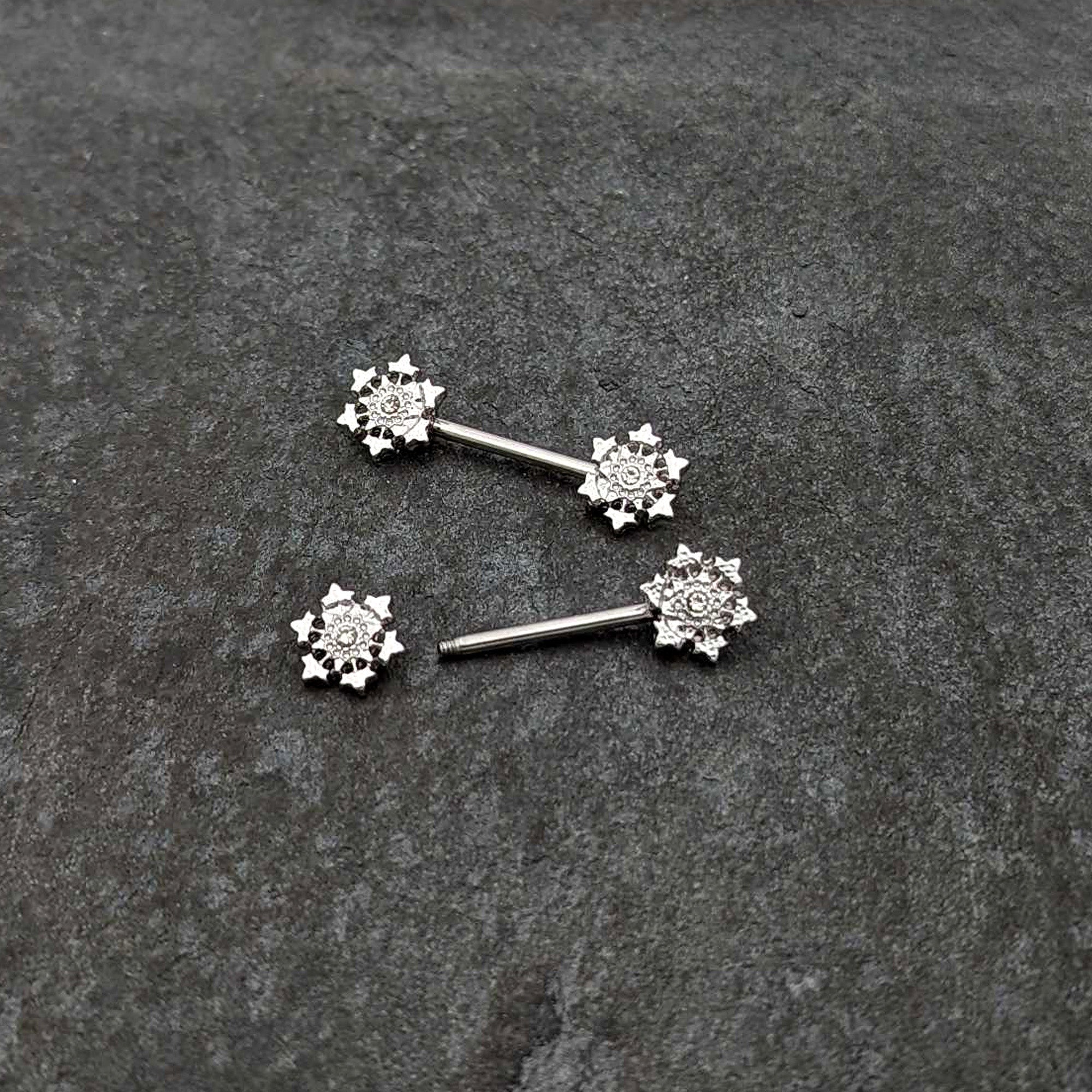 BodyCandy 14G 9/16 Clear Gem Filigree Winter Snowflake Nipple Ring Set — back view