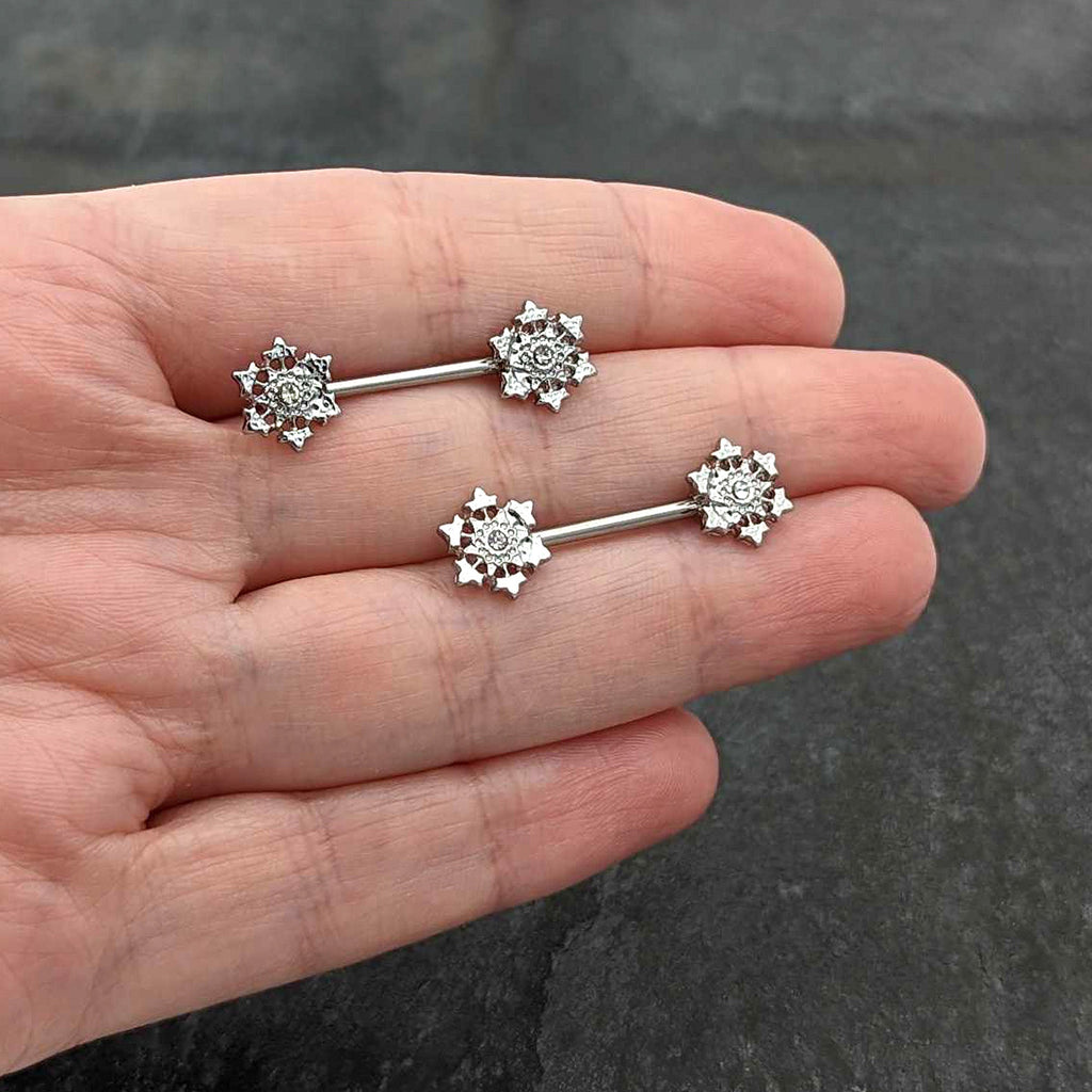 BodyCandy 14G 9/16 Clear Gem Filigree Winter Snowflake Nipple Ring Set — in-use photo