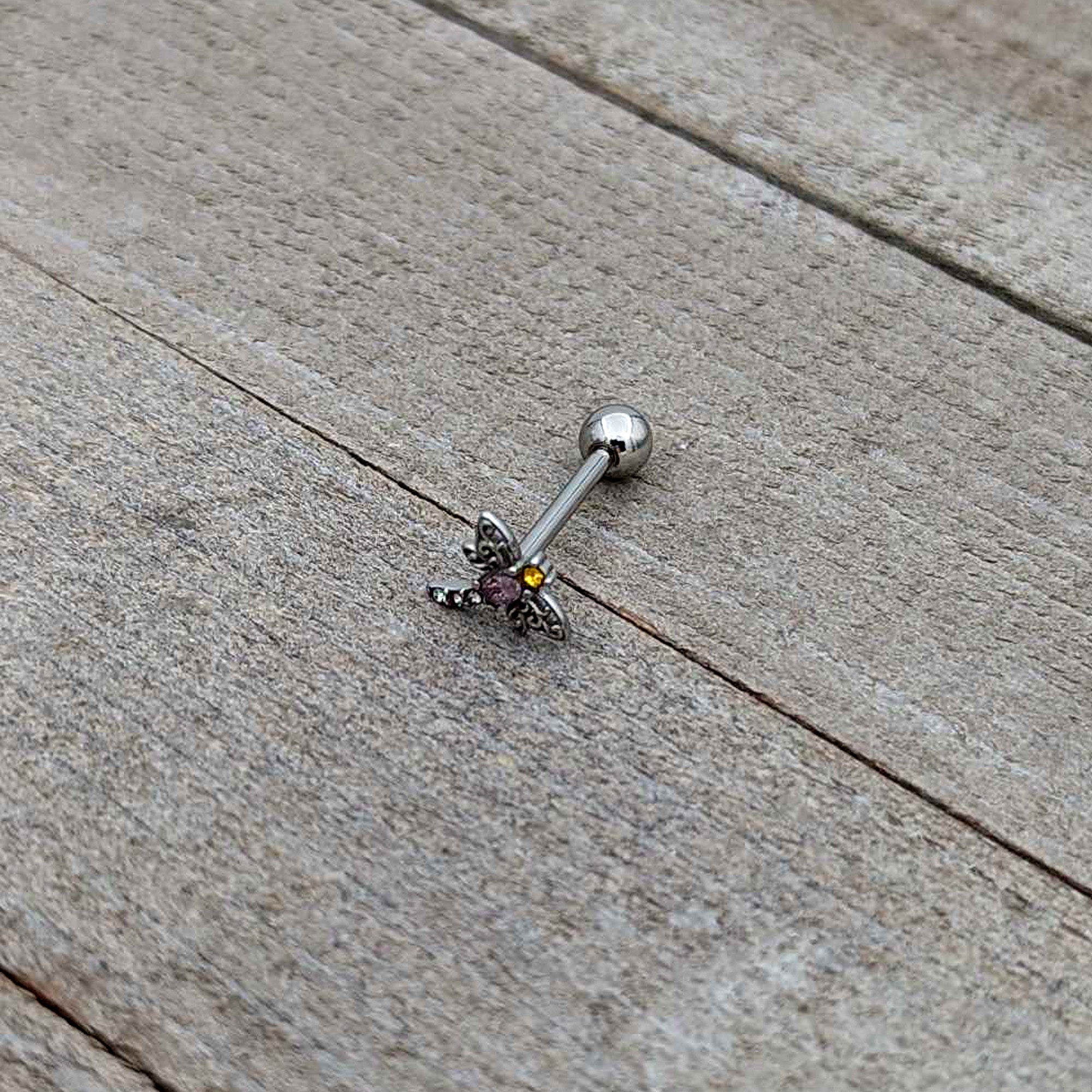 BodyCandy Purple Yellow Clear Gem Dragonfly Barbell Tongue Ring — in-use photo