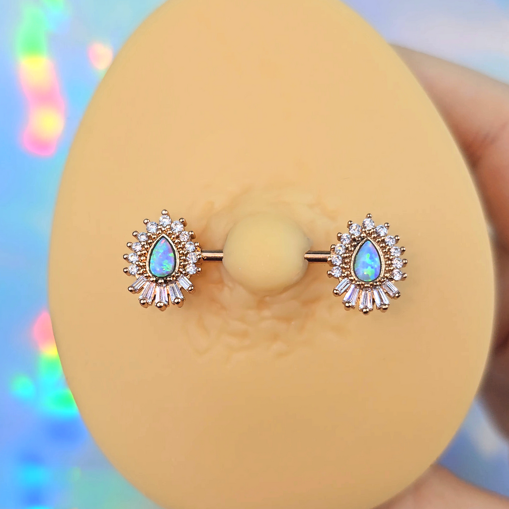 BodyCandy 14G 9/16 White Synthetic Opal Rose Gold Tone Barbell Nipple Ring Set — detail close-up