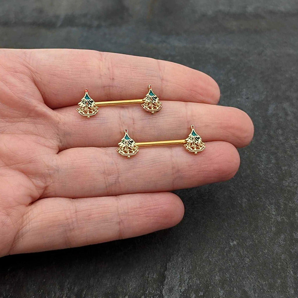 BodyCandy 14G 9/16 Red Gem Gold Hue Deco Holiday Tree Barbell Nipple Ring Set — in-use photo