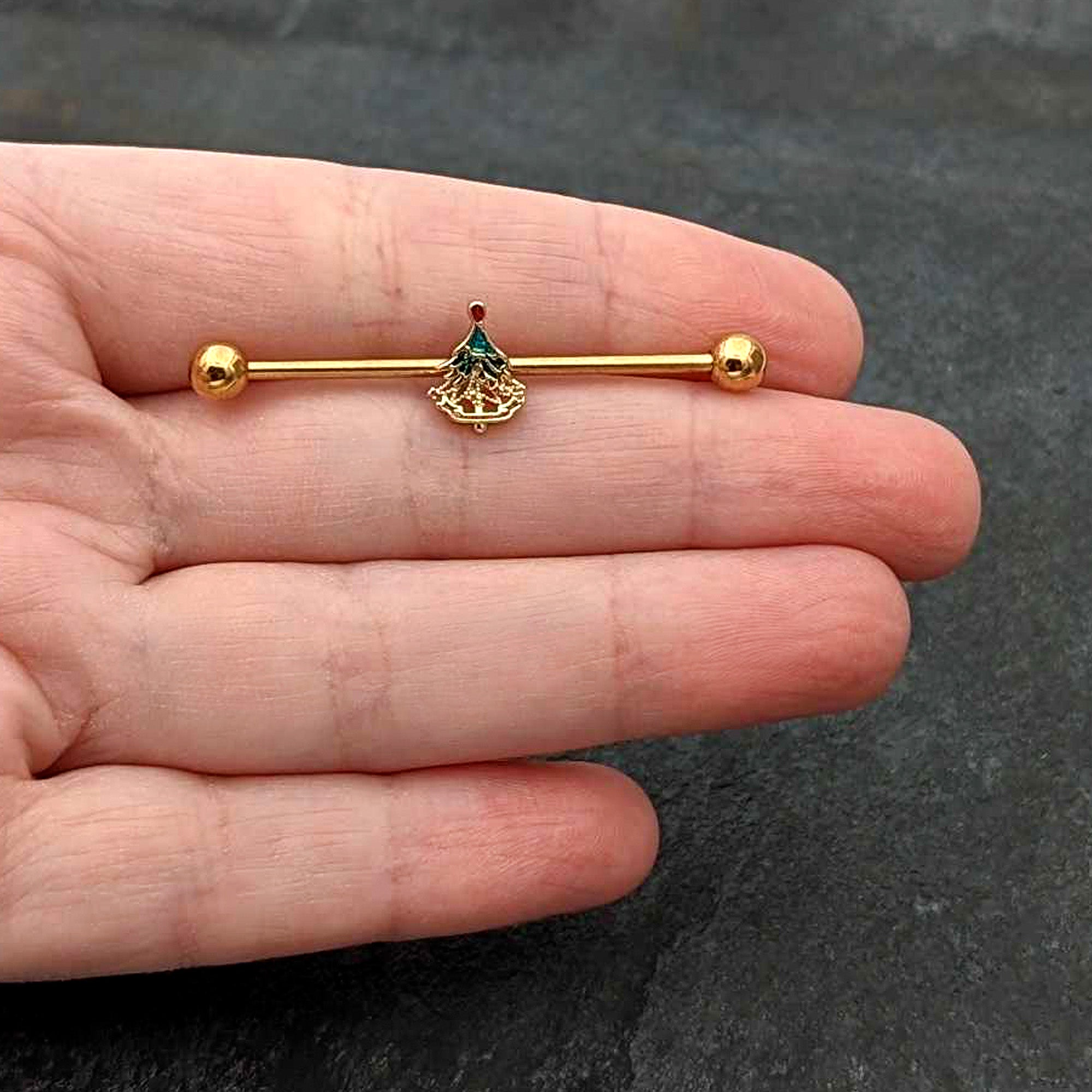 BodyCandy 14G Red Gem Gold Tone Deco Holiday Tree Industrial Barbell 38mm — in-use photo