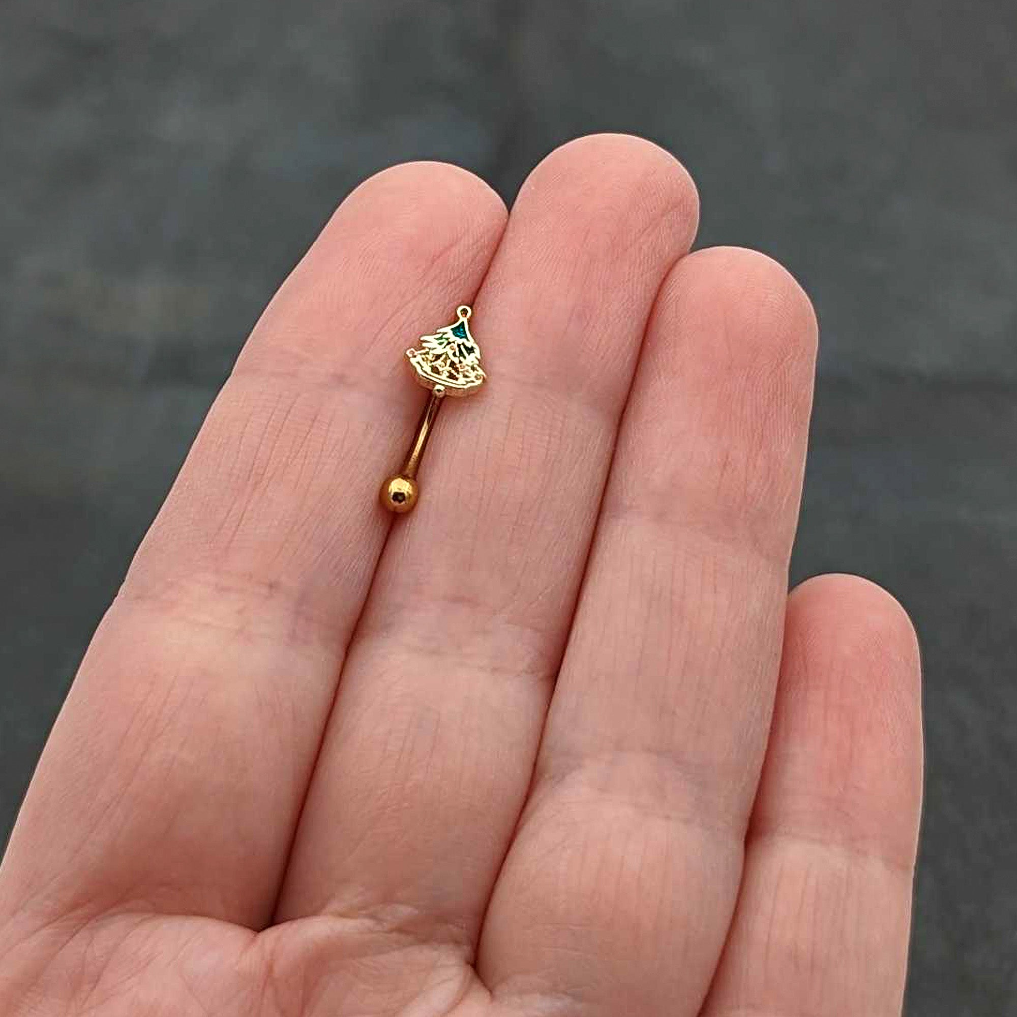 BodyCandy 16G 5/16 Red Gem Gold Tone Deco Holiday Tree Curved Eyebrow Ring — size reference