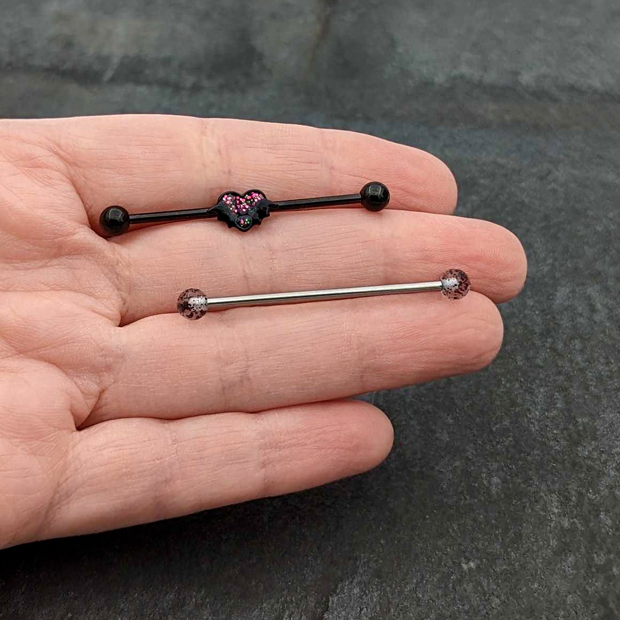 BodyCandy 14G Black Bat Heart Halloween Clear Industrial Barbell 38mm Set of 2 — in-use photo