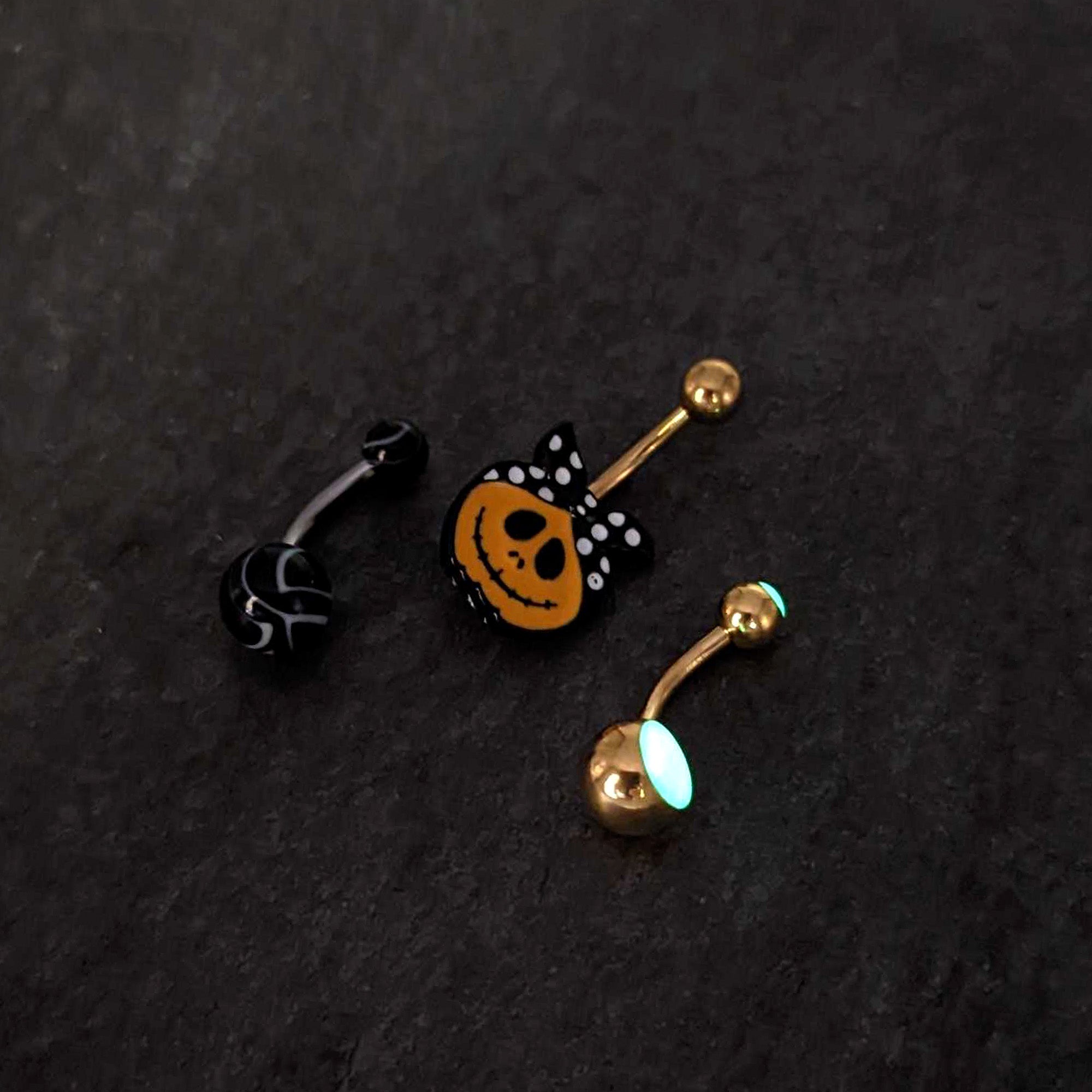BodyCandy Gold Tone Halloween Country Pumpkin Glow in Dark Belly Ring Set of 3 — in-use photo
