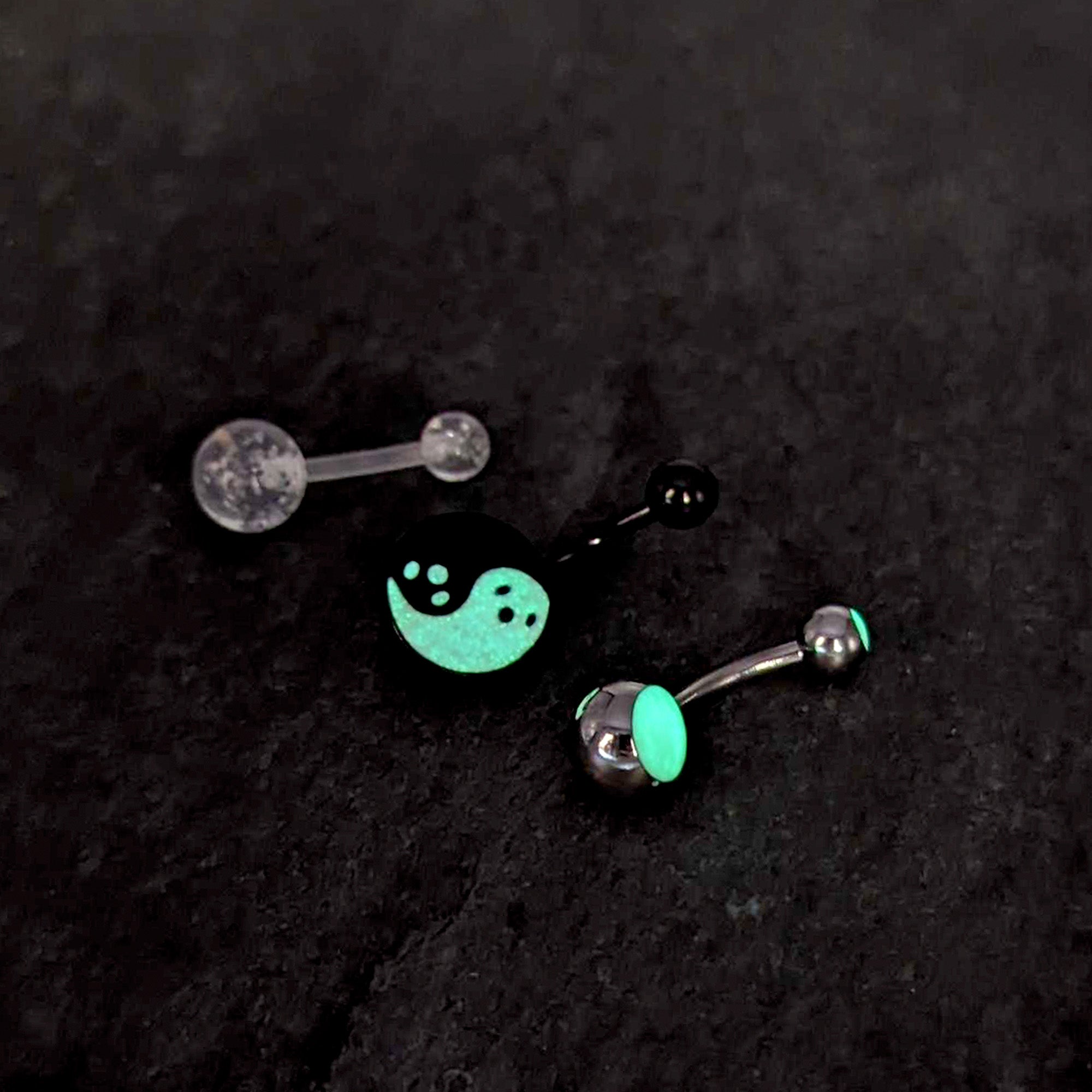 BodyCandy Black Yin Yang Ghost Glow in Dark Halloween Clear Belly Ring Set of 3 — in-use photo