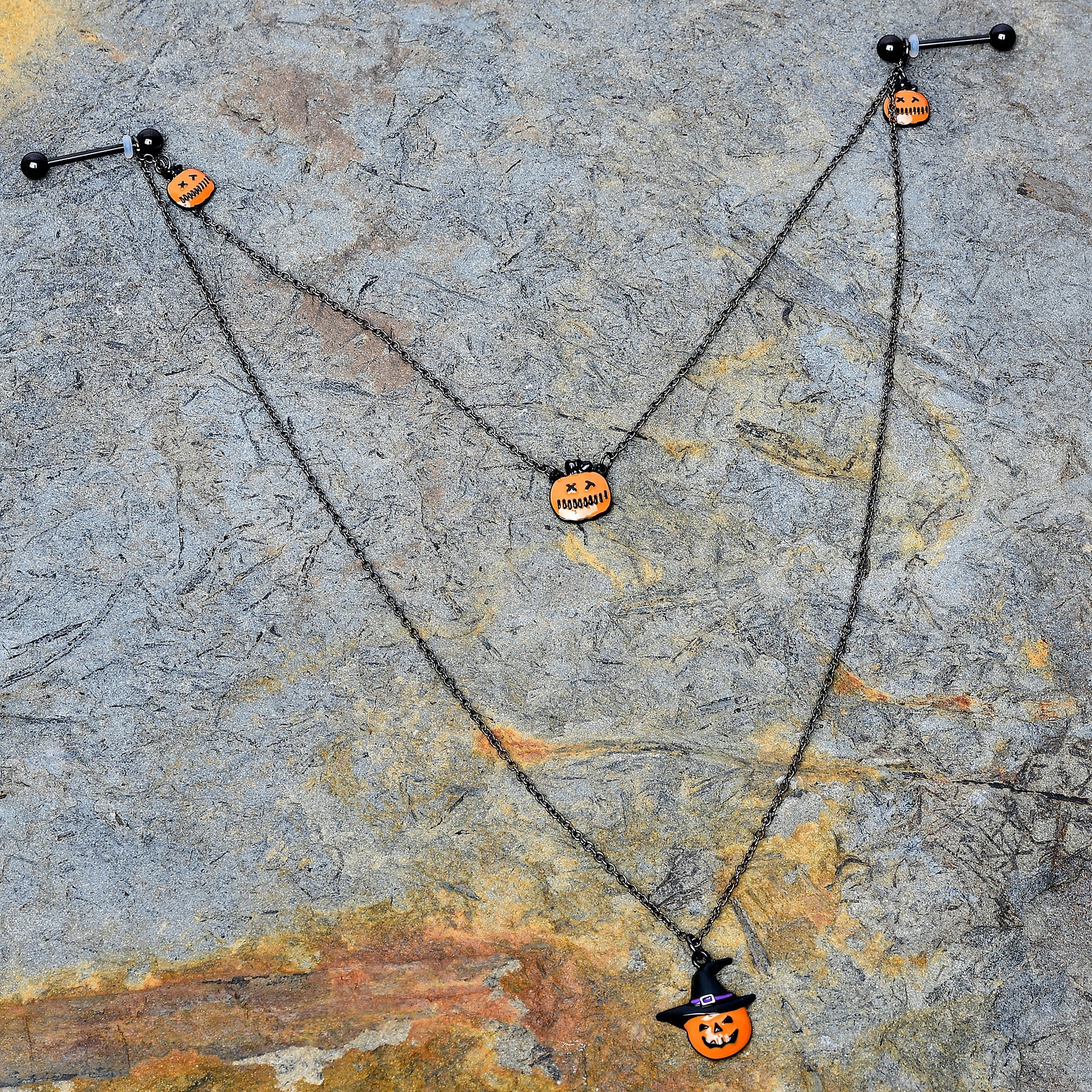 BodyCandy 14G 9/16 Black Witchy Pumpkin Halloween Double Nipple Chain — detail close-up