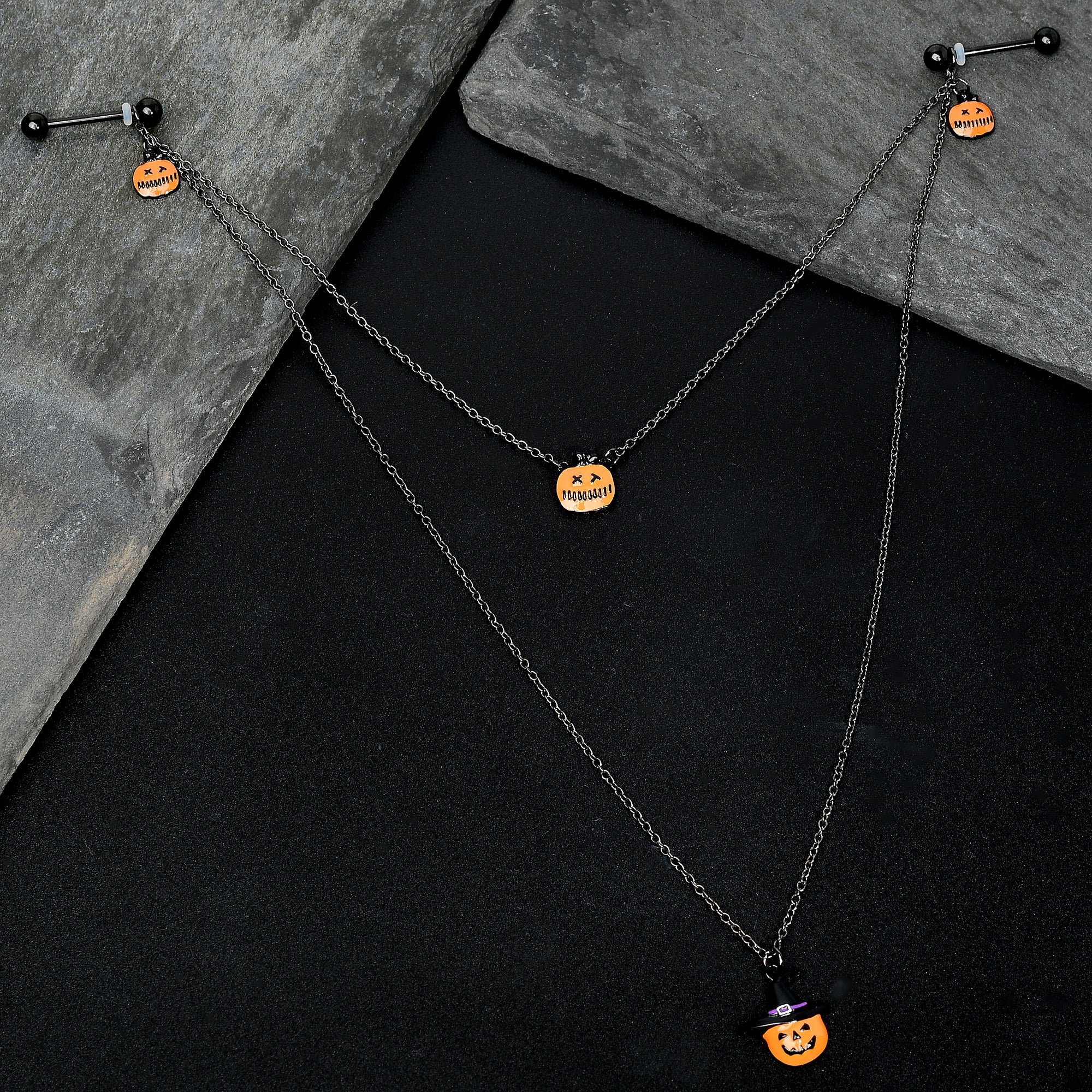 BodyCandy 14G 9/16 Black Witchy Pumpkin Halloween Double Nipple Chain — lifestyle context