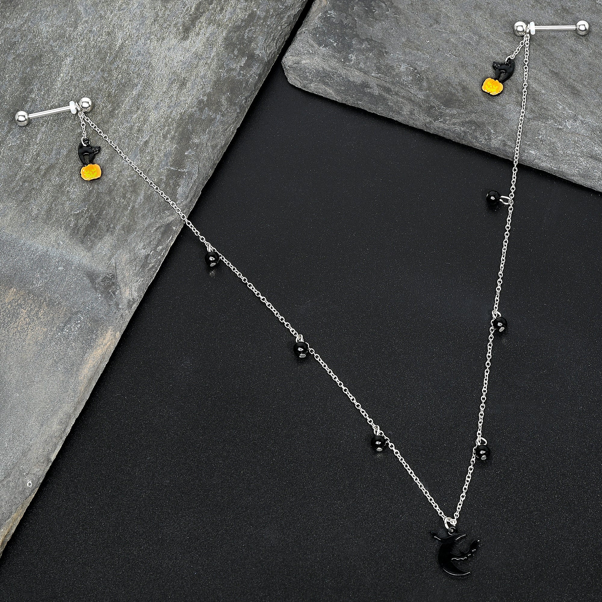 BodyCandy 14G 9/16 Pumpkin Black Cat Moon Bats Dangle Halloween Nipple Chain — detail close-up