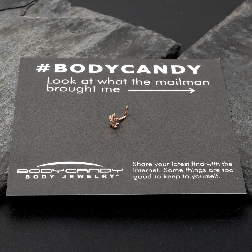 BodyCandy 20G 1/4 Rose Gold Tone Texture Pot Leaf L Shape Nose Ring — in-use photo
