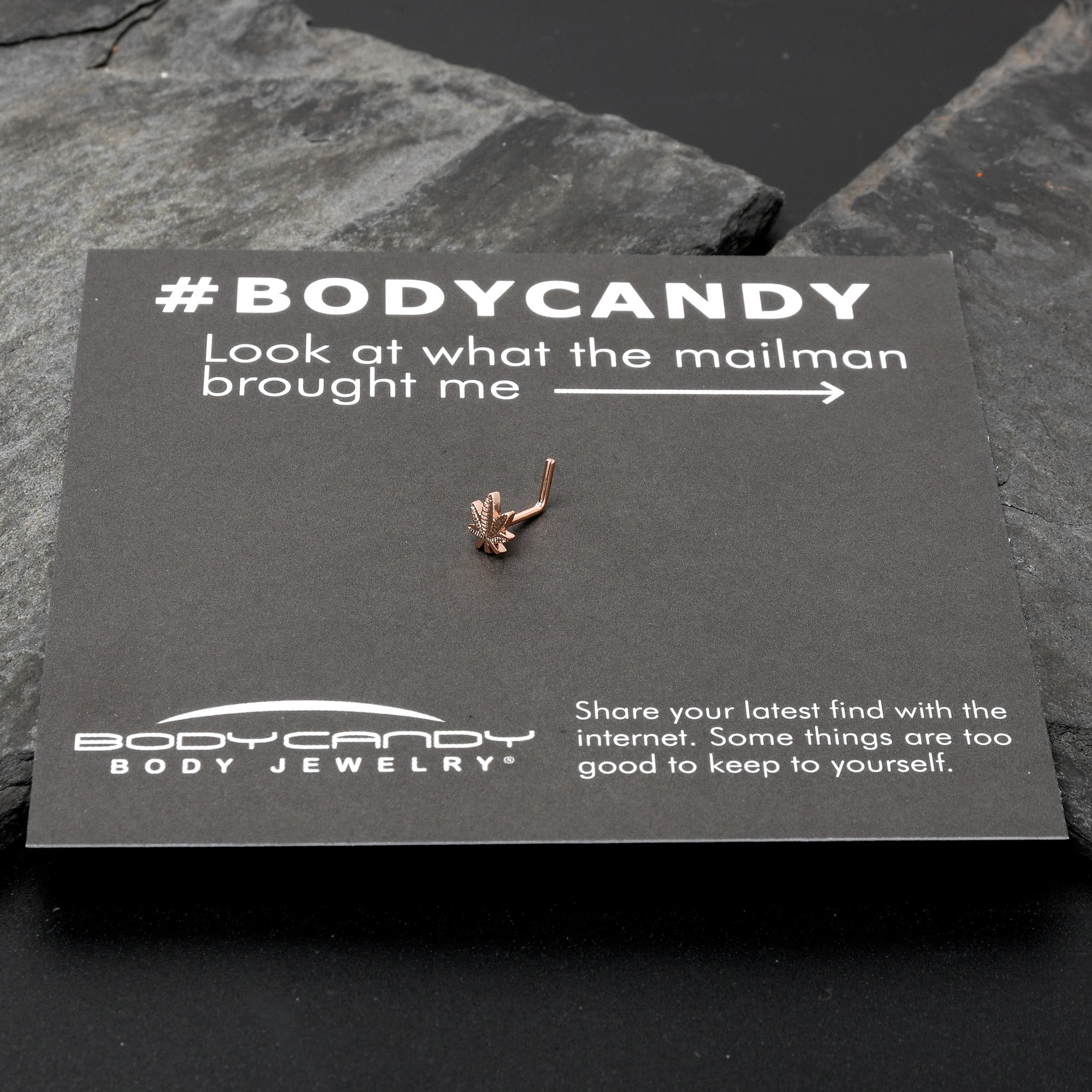 BodyCandy 20G 1/4 Rose Gold Tone Texture Pot Leaf L Shape Nose Ring — in-use photo