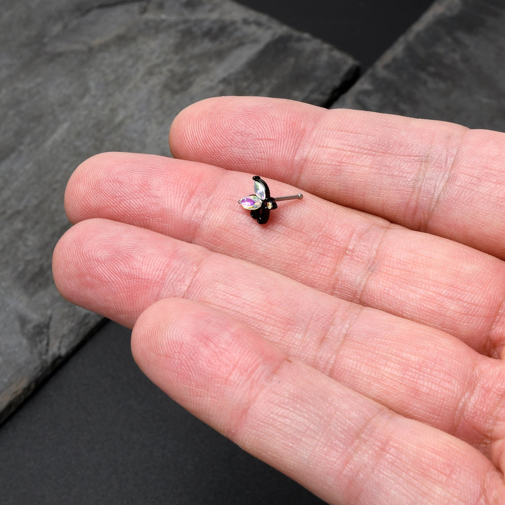 BodyCandy 20G 1/4 Aurora CZ Gem Fleur de Lis Butterfly Black Nose Bone — in-use photo