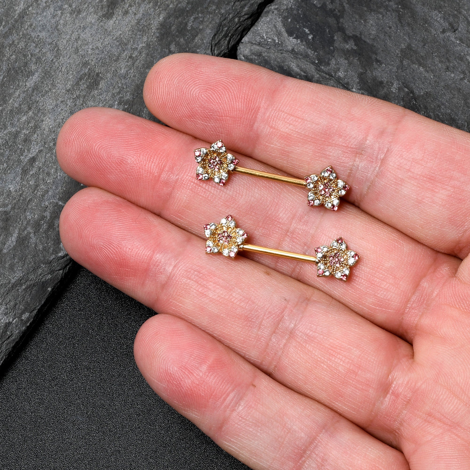 BodyCandy 14G 9/16 Pink Gem Gold Tone Texture Star Barbell Nipple Ring Set — back view