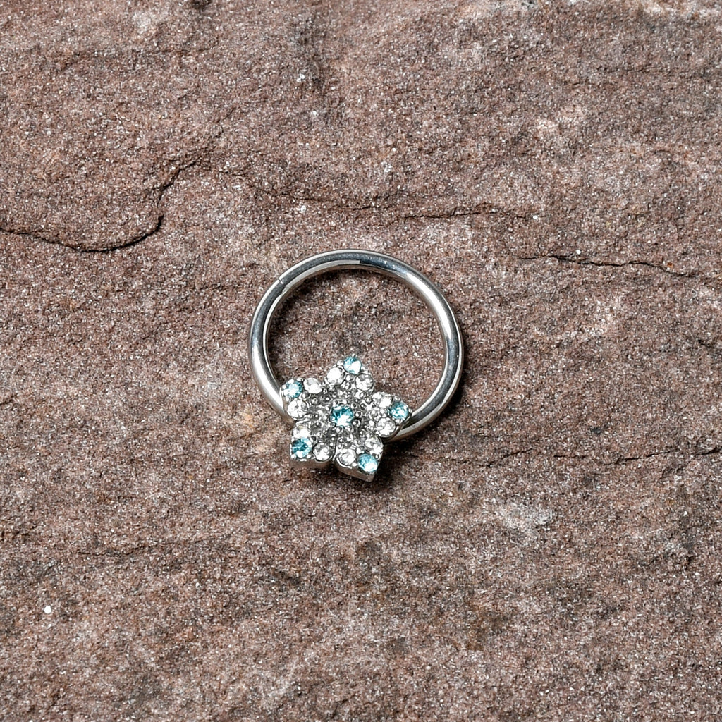 BodyCandy 16G 3/8 Blue Clear Gem Opulent Flower Hinged Segment Ring — lifestyle context