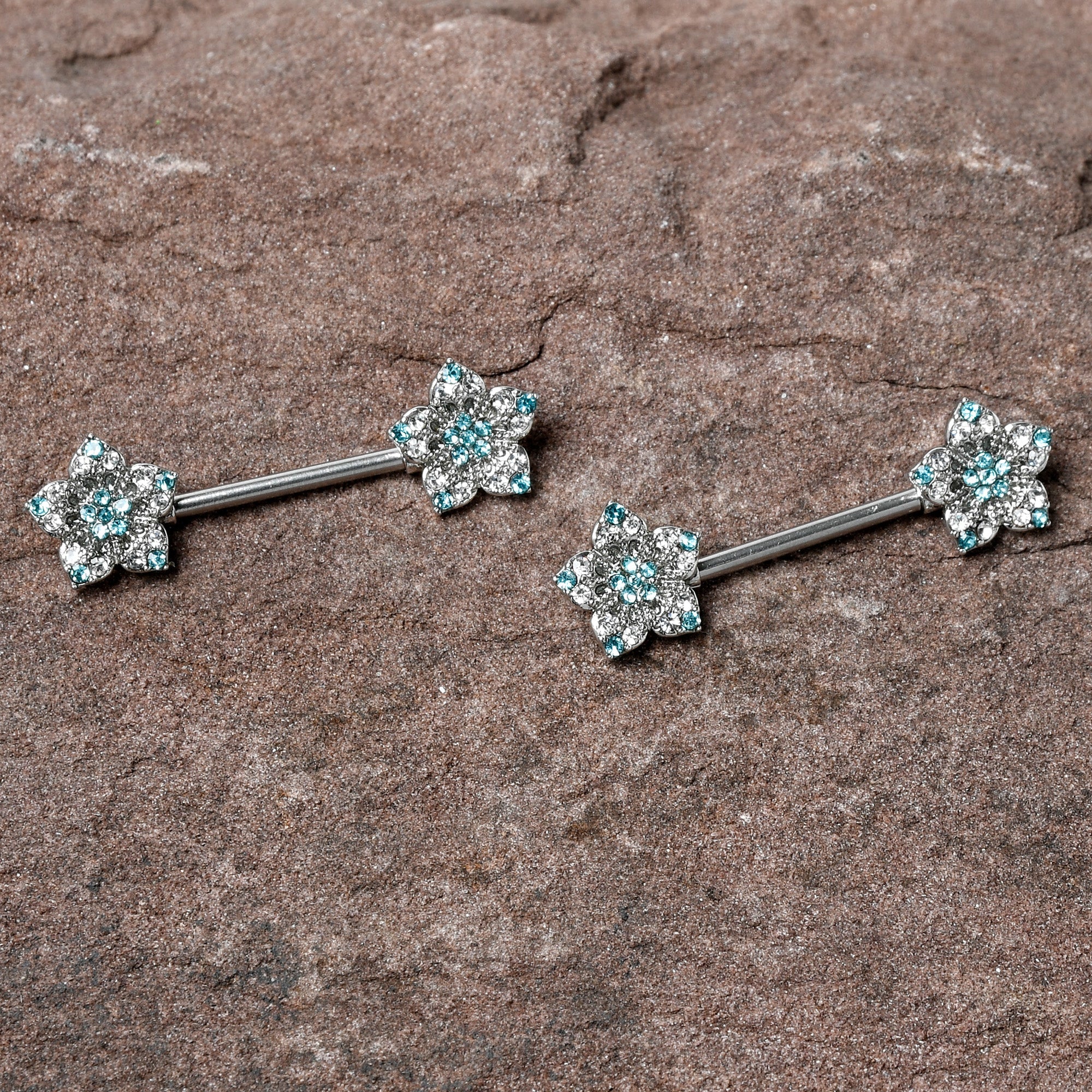BodyCandy 14G 9/16 Blue Clear Gem Opulent Flowers Barbell Nipple Ring Set — detail close-up