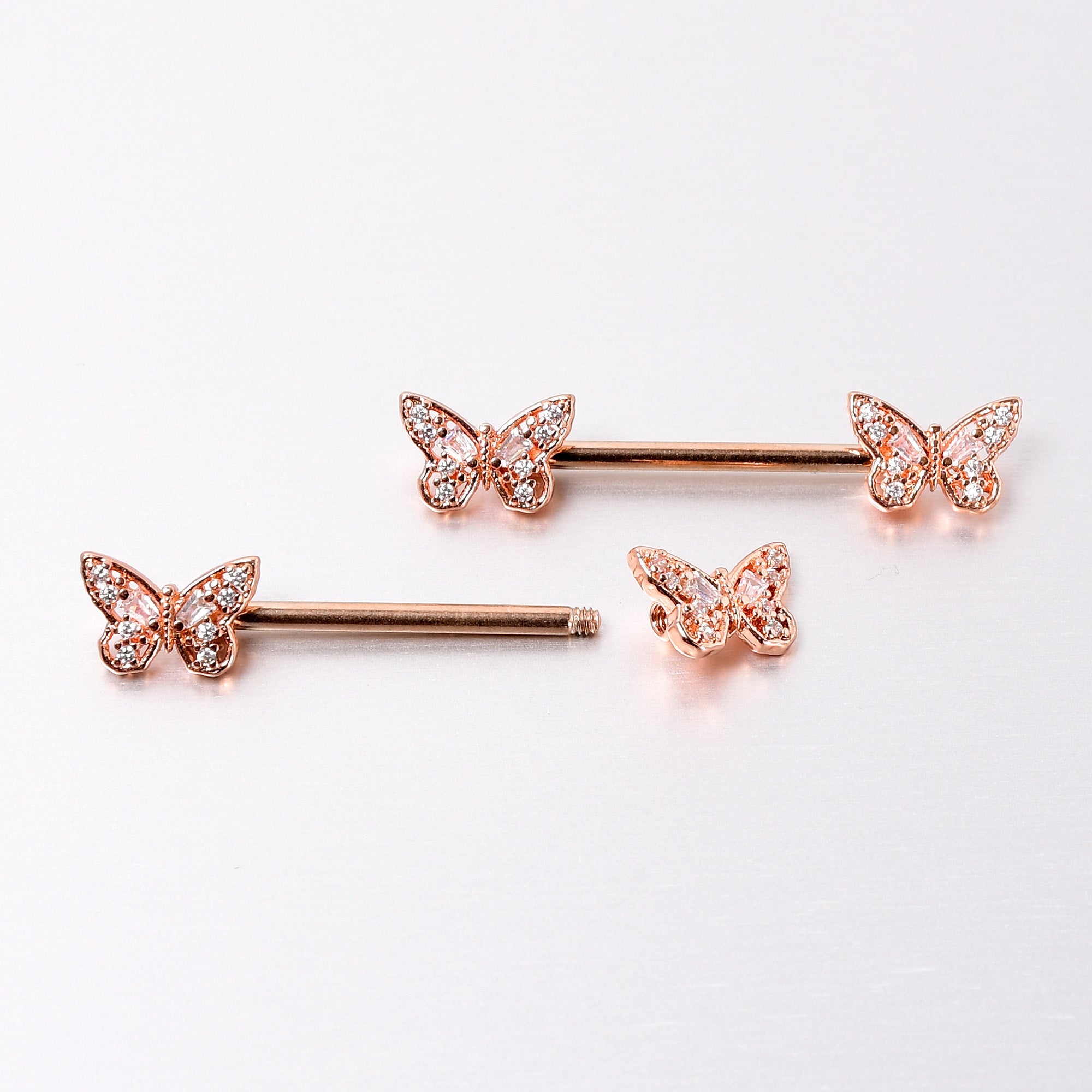 BodyCandy 14G 9/16 Clear Gem Rosy Tone Baroque Butterfly Nipple Ring Set — back view