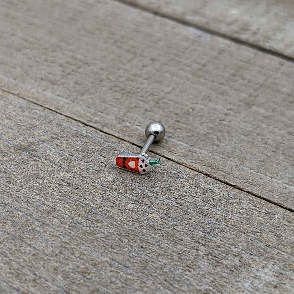 BodyCandy 16G 5/16 Sweet Pumpkin Frappe Autumn Cartilage Tragus Earring — in-use photo