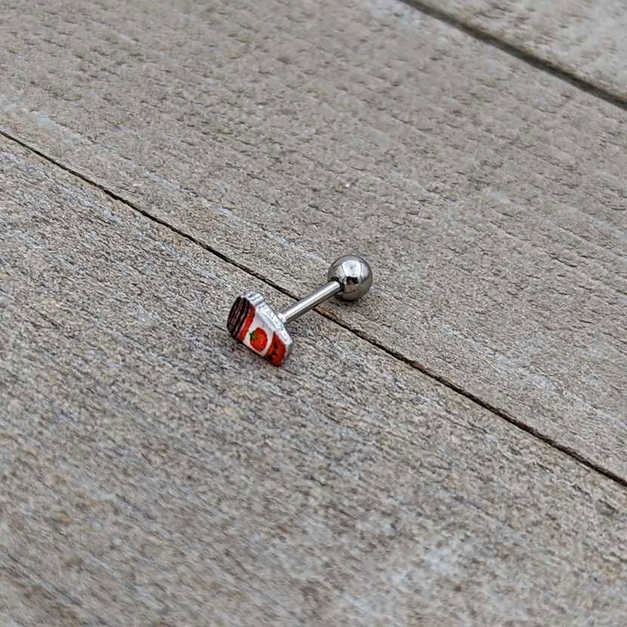 BodyCandy 16G 5/16 Sweet Pumpkin Latte Autumn Cartilage Tragus Earring — in-use photo