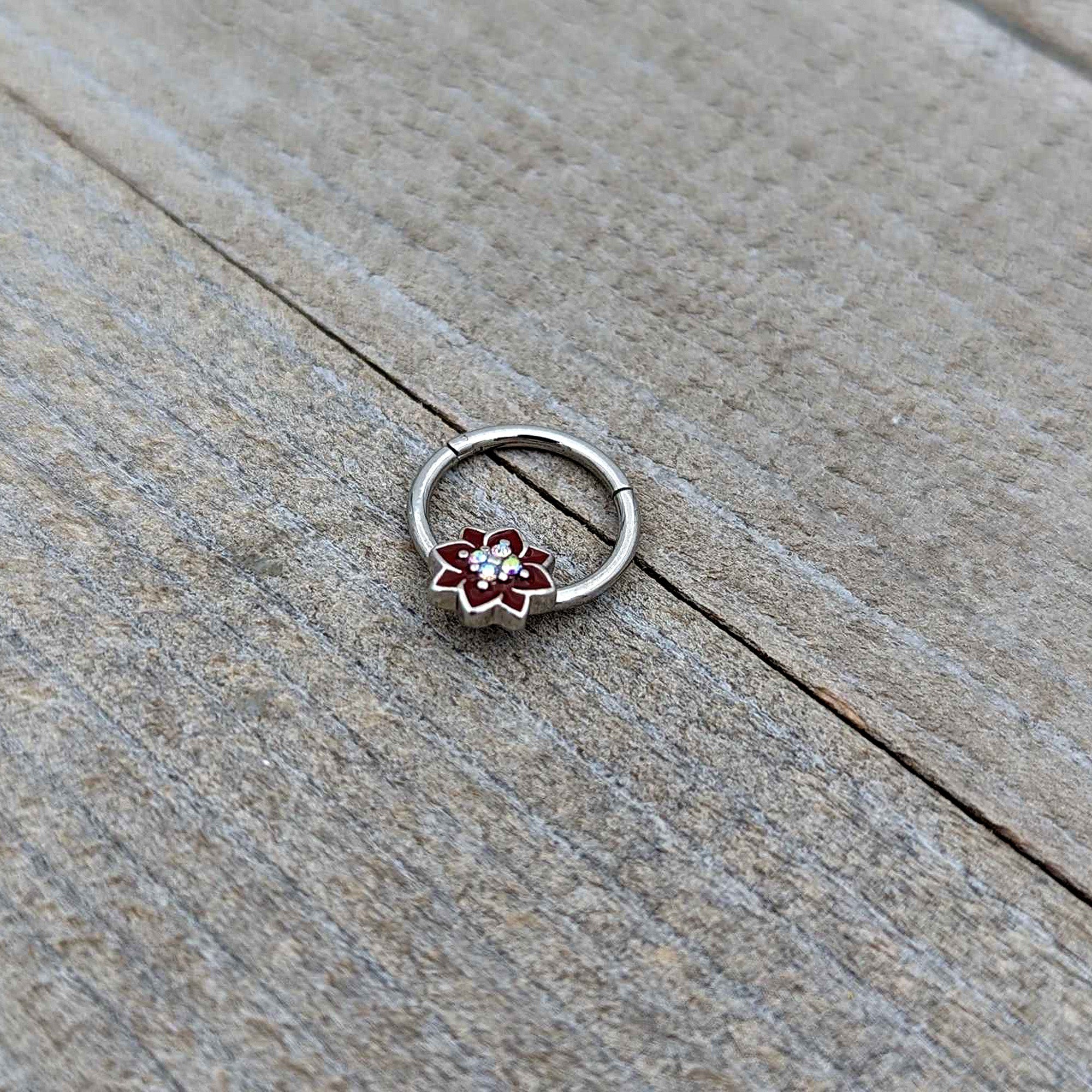 BodyCandy 16G 3/8 Aurora Gem Poinsettia Flower Festive Hinged Segment Ring — alternative angle