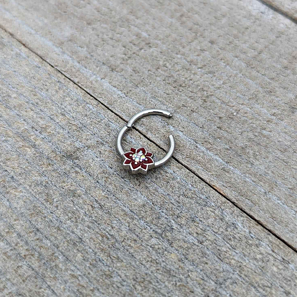 BodyCandy 16G 3/8 Aurora Gem Poinsettia Flower Festive Hinged Segment Ring — in-use photo