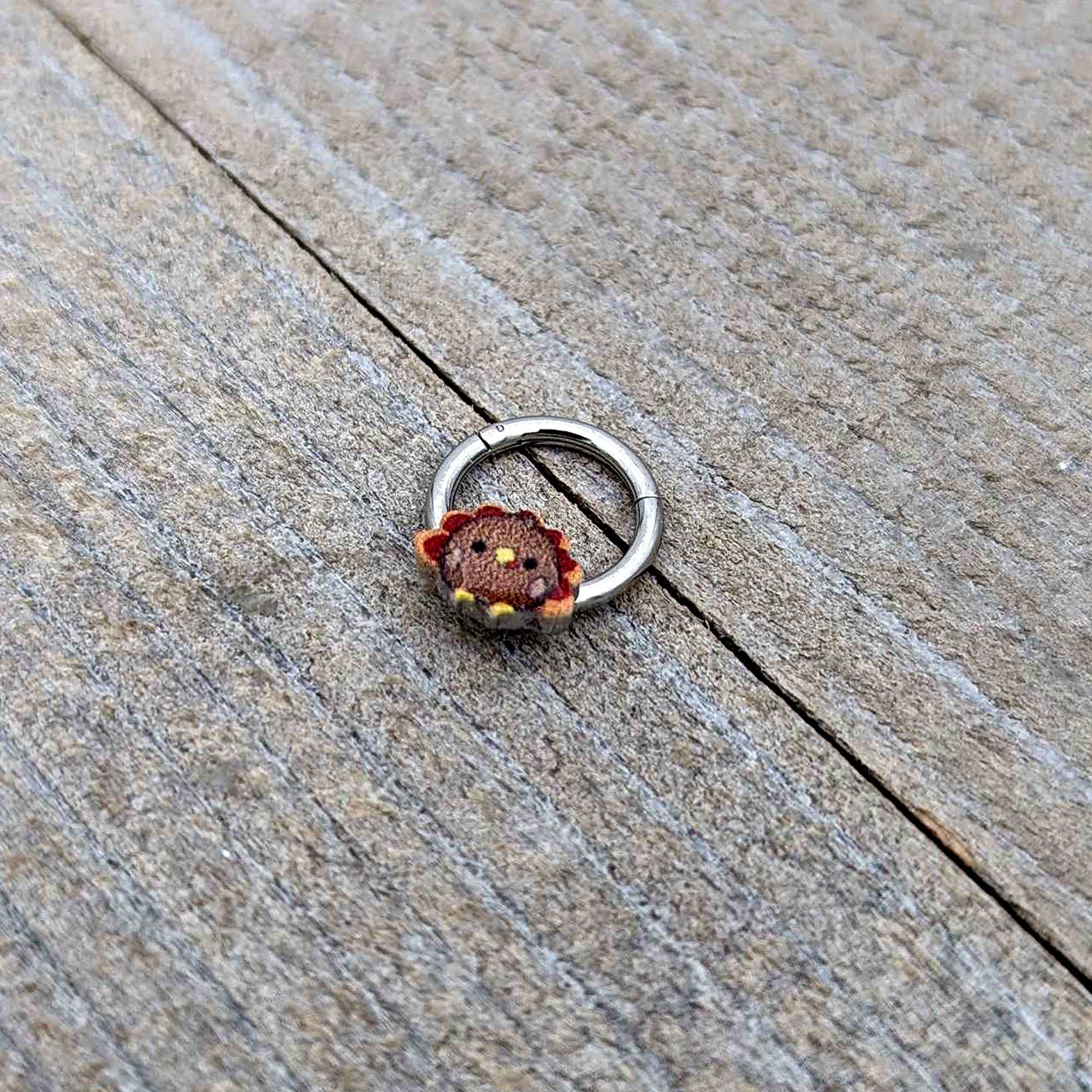 BodyCandy 16G 5/16 Sweet Tiny Turkey Thanksgiving Hinged Segment Ring — in-use photo