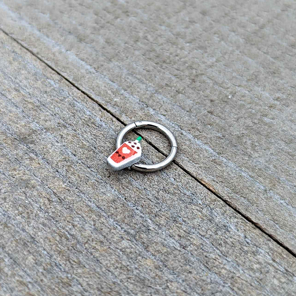 BodyCandy 16G 5/16 Sweet Pumpkin Frappe Autumn Hinged Segment Ring — in-use photo