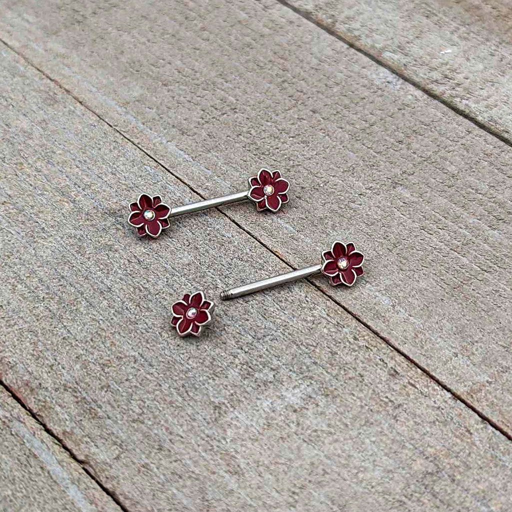 BodyCandy 14G 9/16 Aurora Gem Poinsettia Flower Barbell Nipple Ring Set — in-use photo