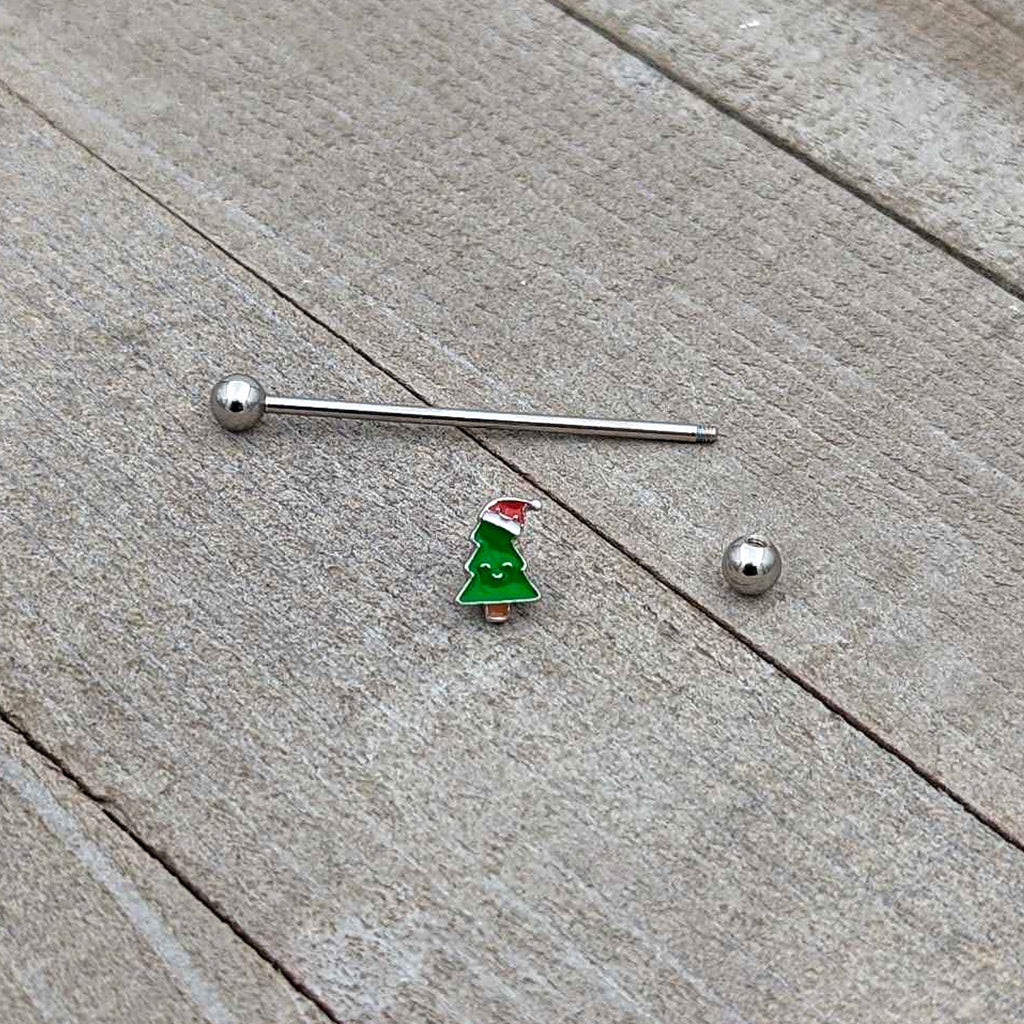 BodyCandy 14G Happy Christmas Tree Hat Holiday Industrial Barbell 38mm — in-use photo