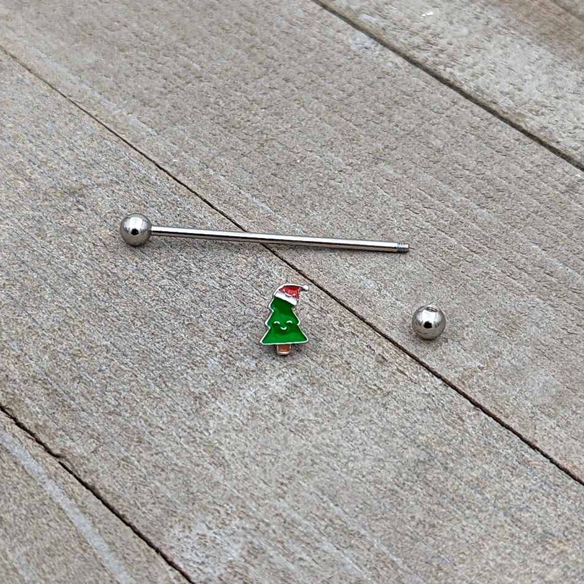 BodyCandy 14G Happy Christmas Tree Hat Holiday Industrial Barbell 38mm — in-use photo