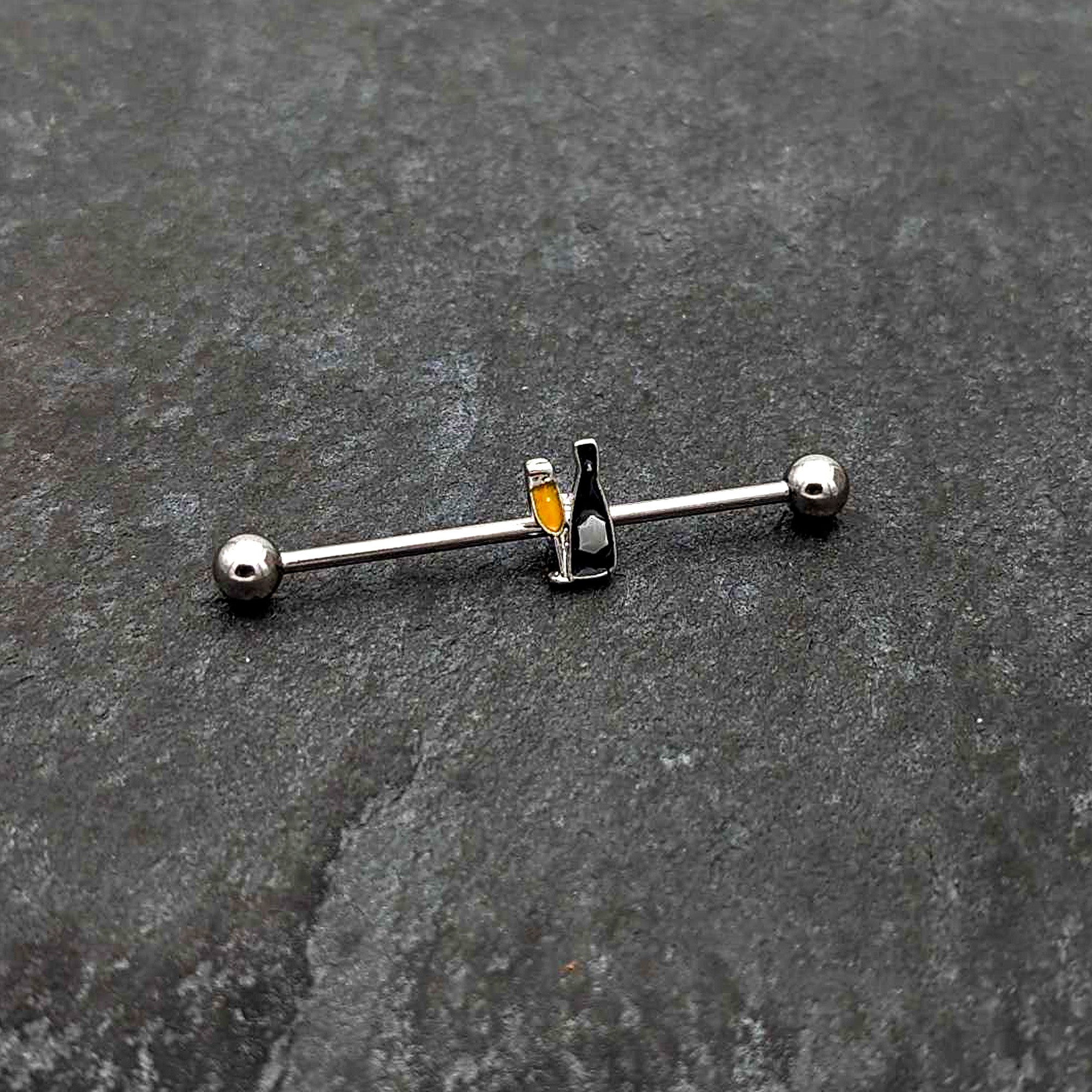 BodyCandy 14G Champagne Bottle Flute Yellow Industrial Barbell 38mm — side view