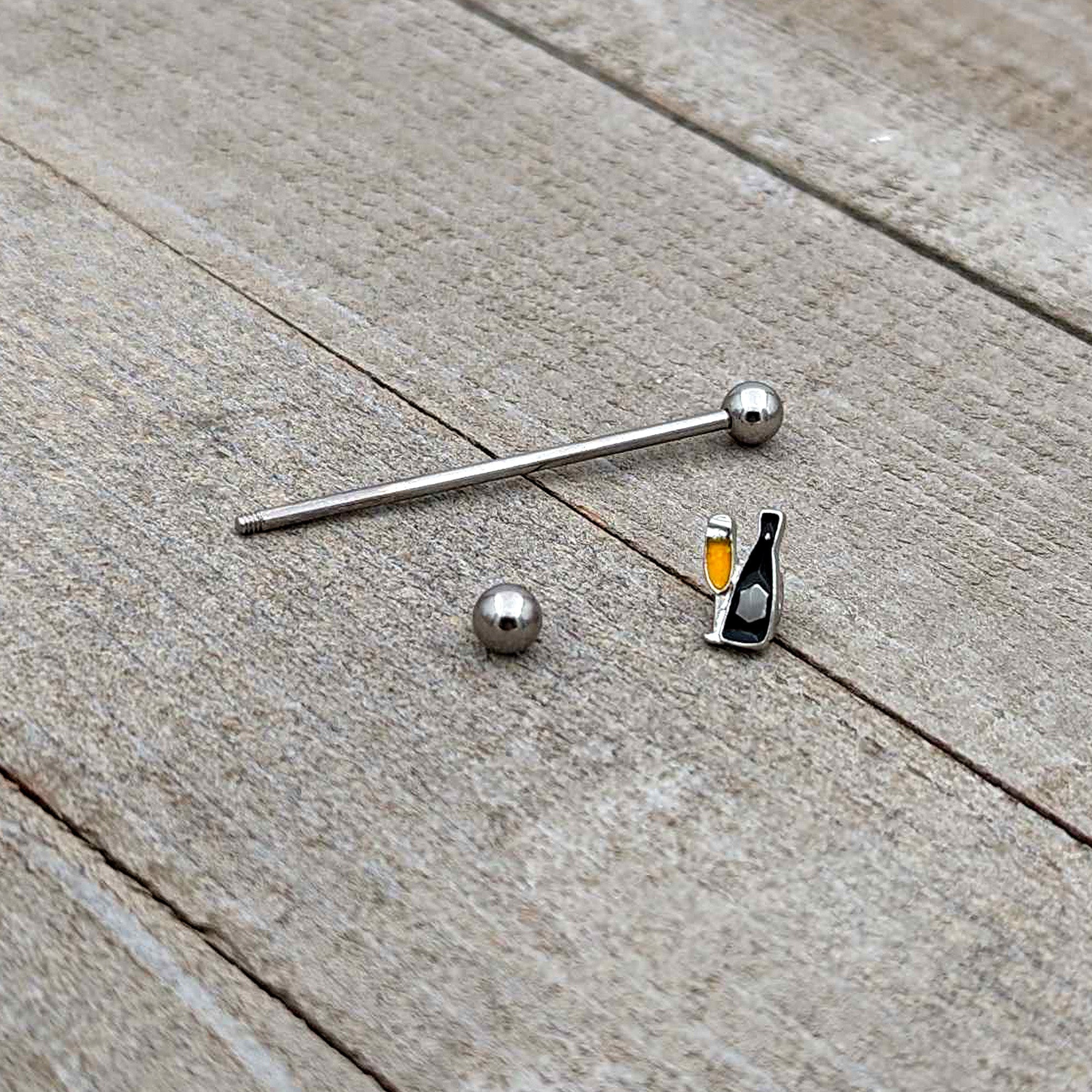 BodyCandy 14G Champagne Bottle Flute Yellow Industrial Barbell 38mm — in-use photo