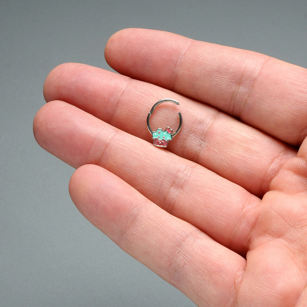 BodyCandy 16G 3/8 Sweet Happy Cupcake Hinged Segment Ring — in-use photo