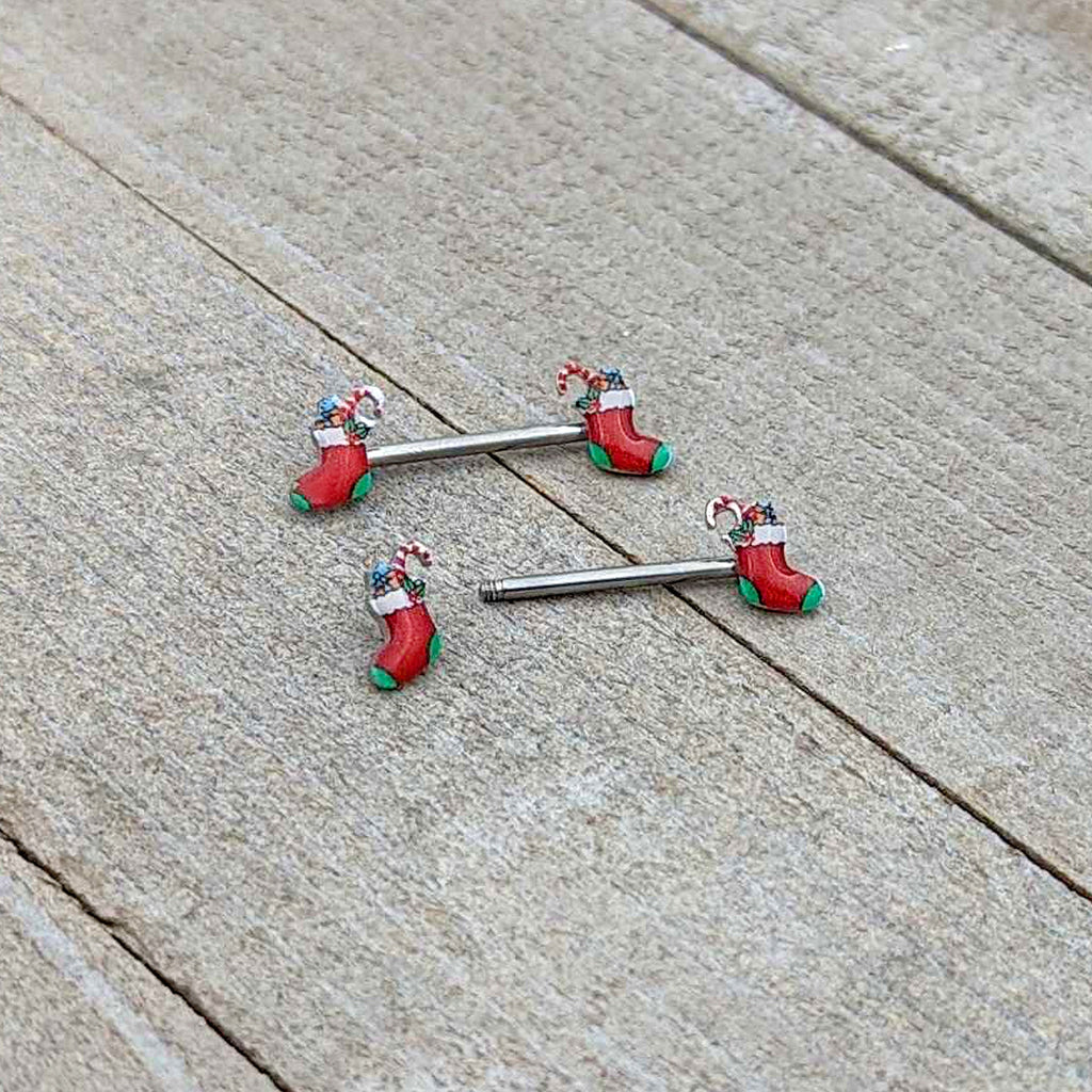 BodyCandy 14G 9/16 Cheery Christmas Stocking Red Barbell Nipple Ring Set — in-use photo
