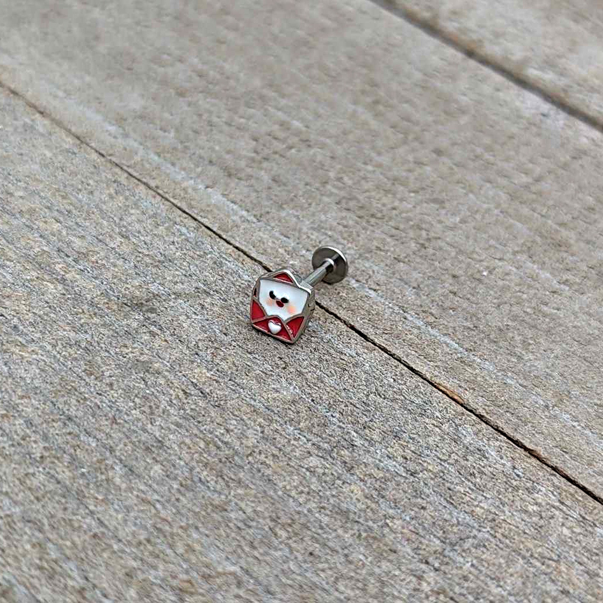 BodyCandy 16G 5/16 Sweet Love Letter Valentine Labret Monroe Tragus — in-use photo