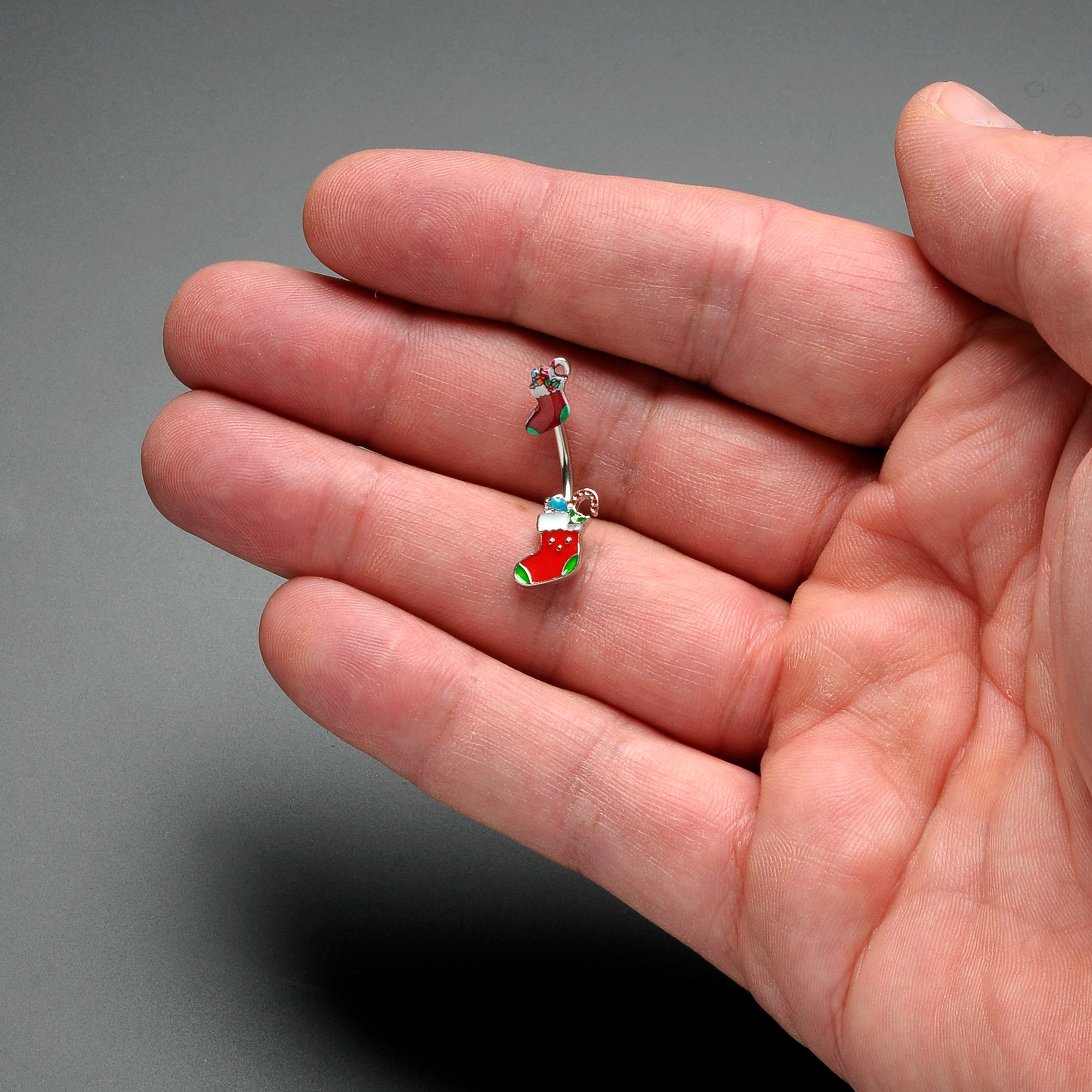 BodyCandy Merry Christmas Stockings Red Green Double Mount Belly Ring — detail close-up