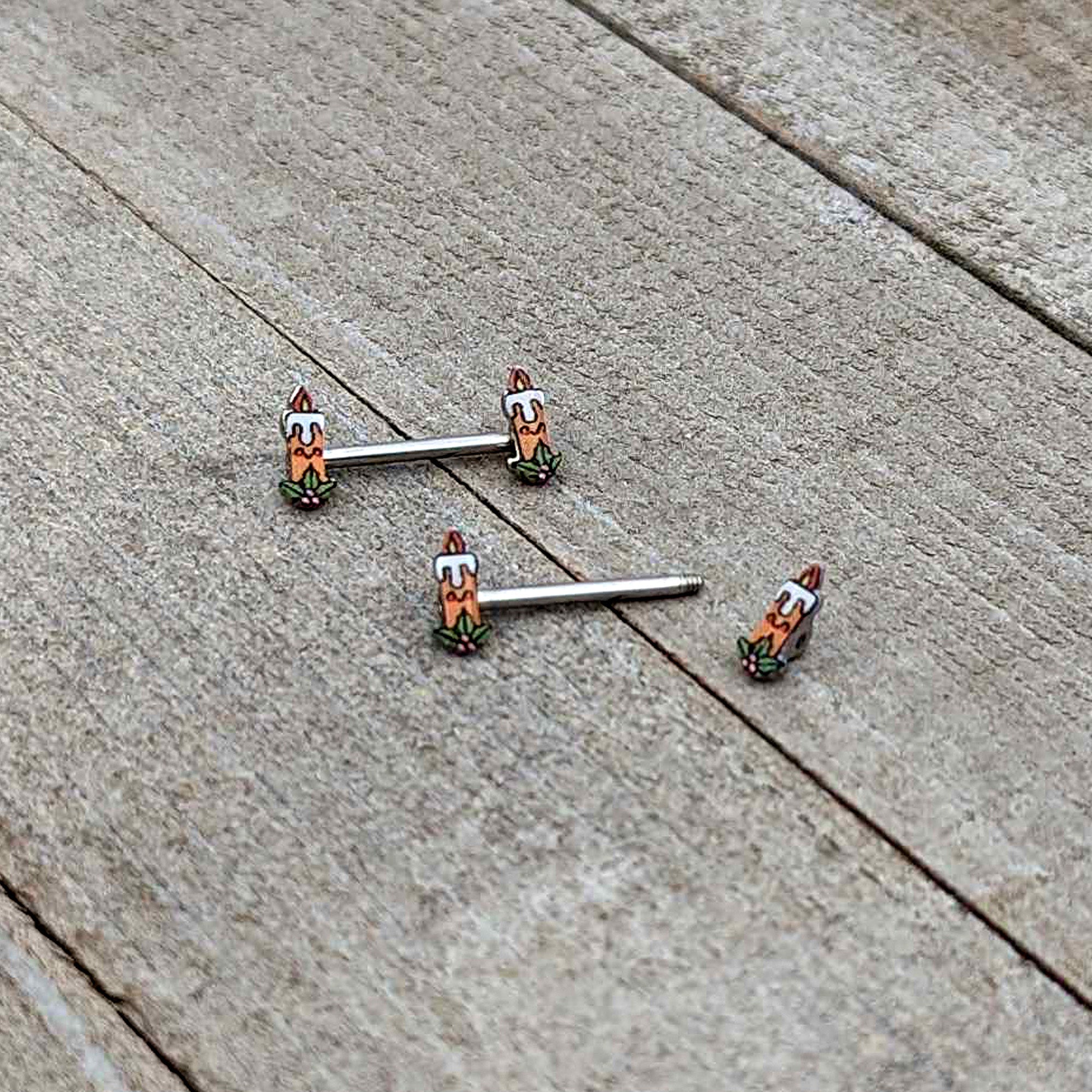 BodyCandy 14G 9/16 Sweet Holiday Christmas Candle Barbell Nipple Ring Set — in-use photo