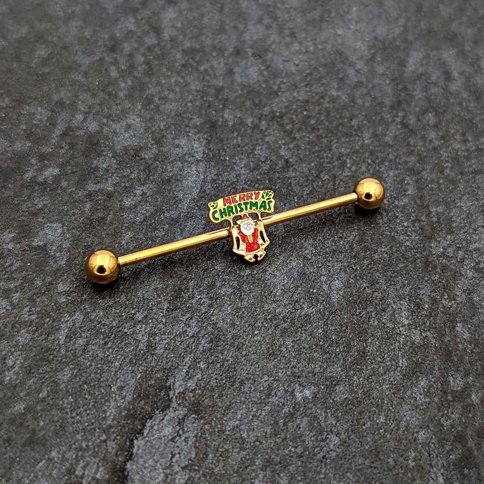 BodyCandy 14G Gold Hue Merry Christmas Santa Inlaid Industrial Barbell 38mm — side view