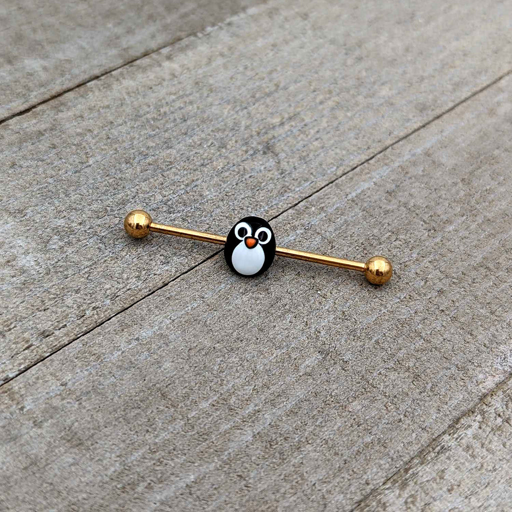 BodyCandy 14G Gold Tone Round Penguin Face Holiday Industrial Barbell 38mm — in-use photo