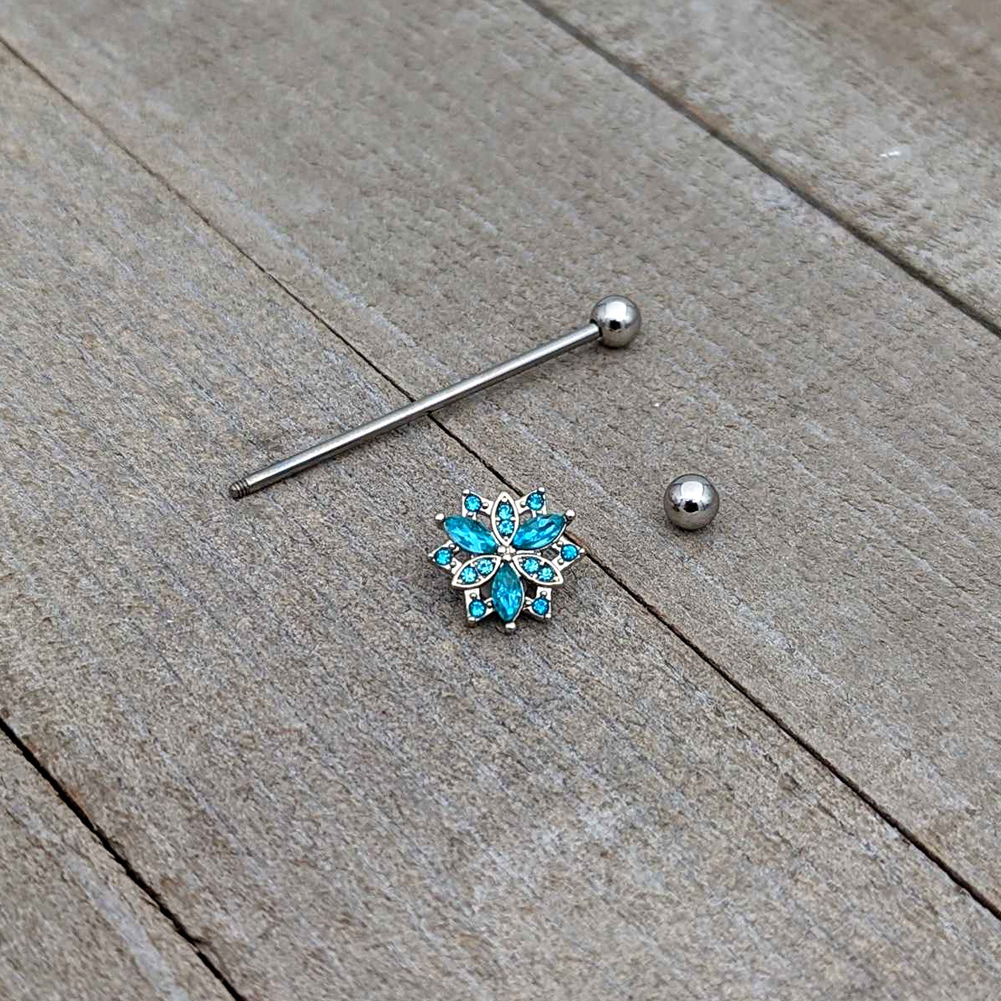 BodyCandy 14G Blue CZ Gem Ornate Snowflake Industrial Barbell 38mm — in-use photo