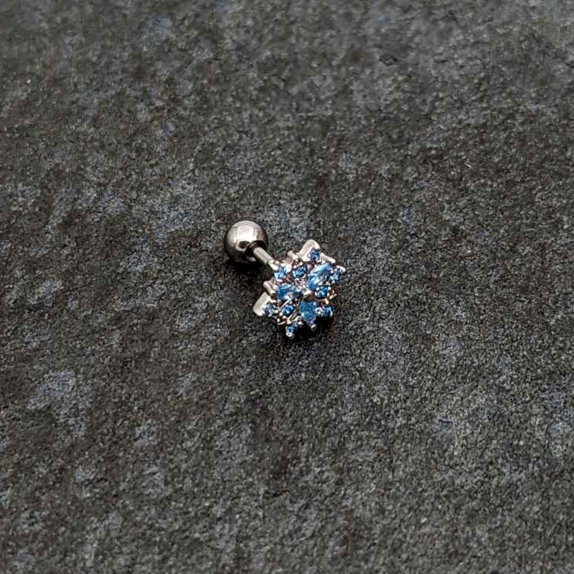 BodyCandy 16G 1/4 Blue CZ Gem Snowflake Blues Cartilage Tragus Earring — alternative angle