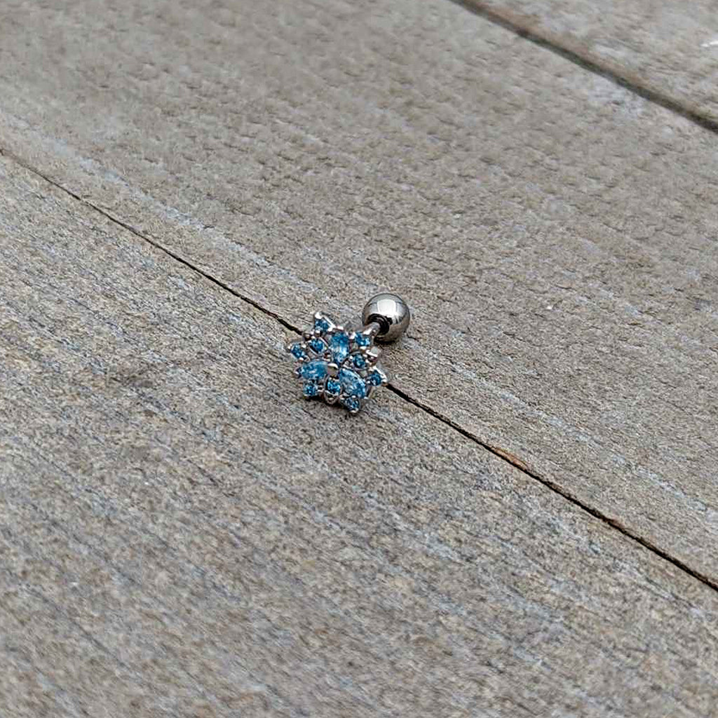 BodyCandy 16G 1/4 Blue CZ Gem Snowflake Blues Cartilage Tragus Earring — in-use photo