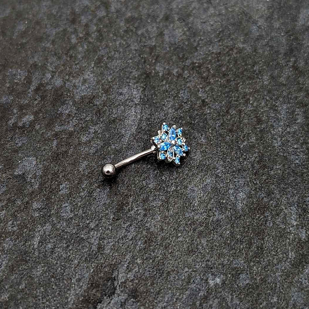 BodyCandy 16G 5/16 Blue CZ Gem Snowflake Blues Curved Eyebrow Ring — side view