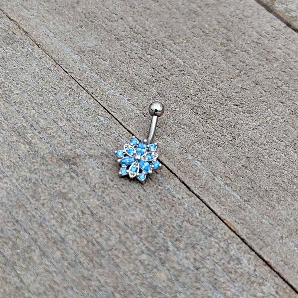 BodyCandy 16G 5/16 Blue CZ Gem Snowflake Blues Curved Eyebrow Ring — alternative angle