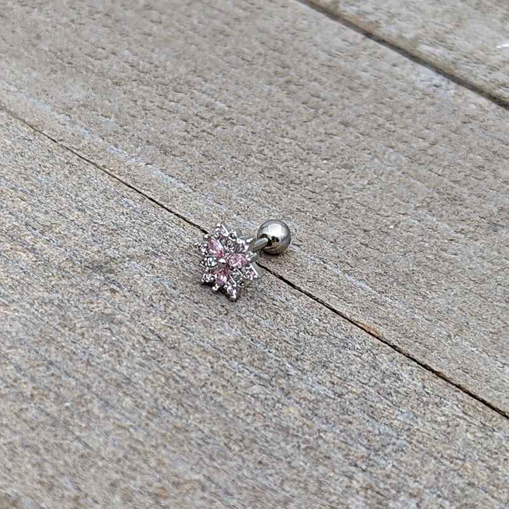 BodyCandy 16G 1/4 Pink Clear CZ Gem Snowflake Cartilage Tragus Earring — in-use photo