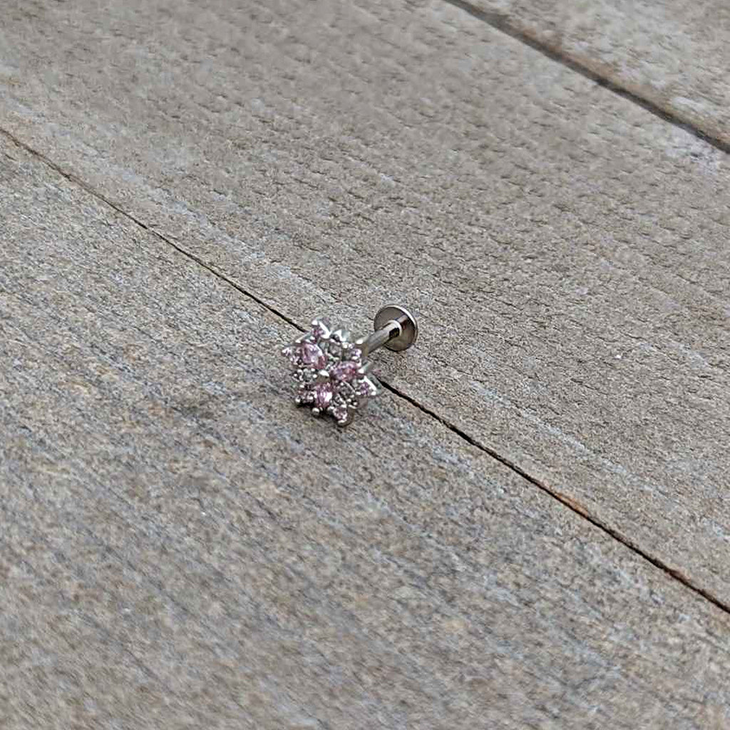 BodyCandy 16G 5/16 Pink Clear CZ Gem Snowflake Labret Monroe Tragus — in-use photo